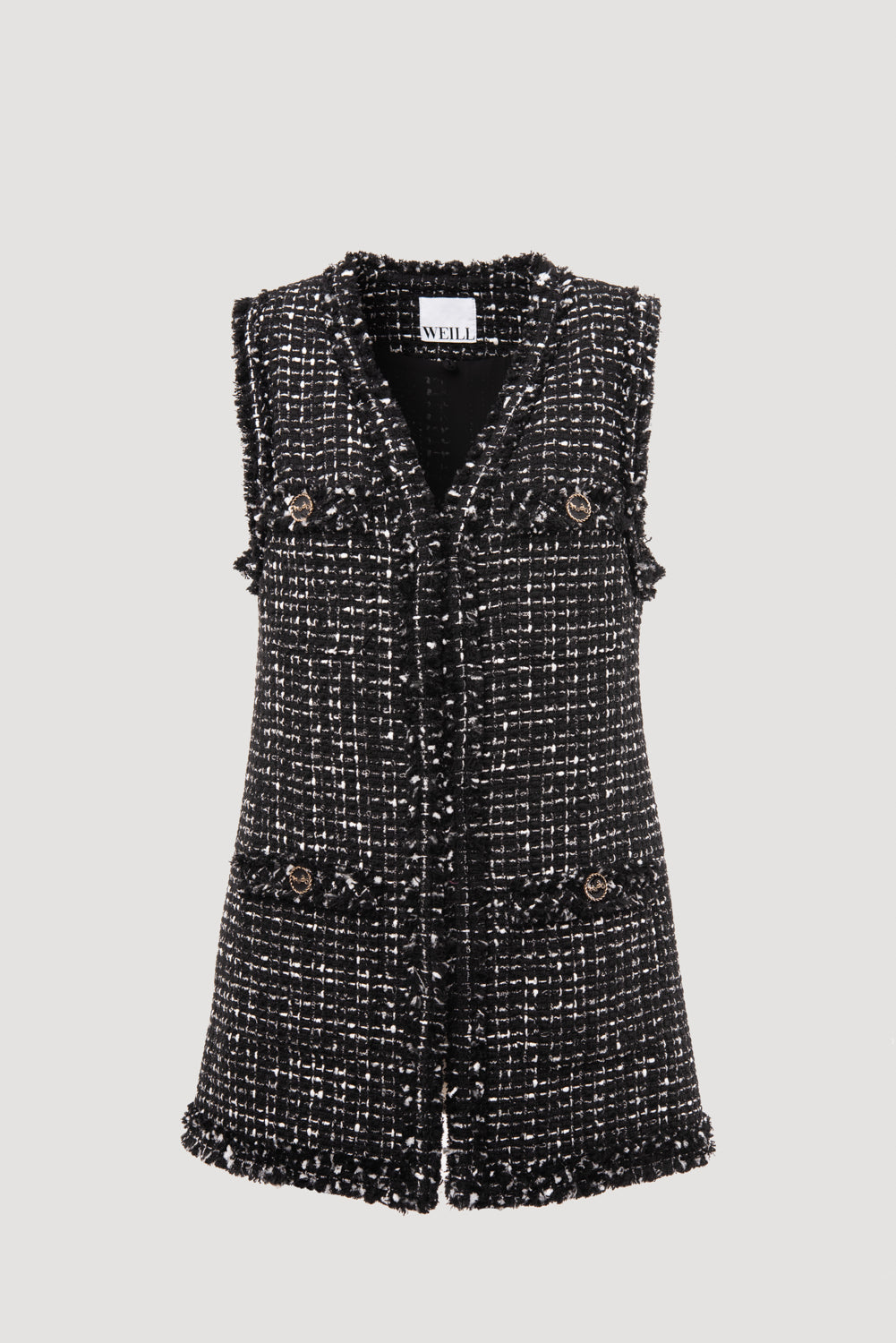 Two-tone sleeveless jacket in fringed tweed