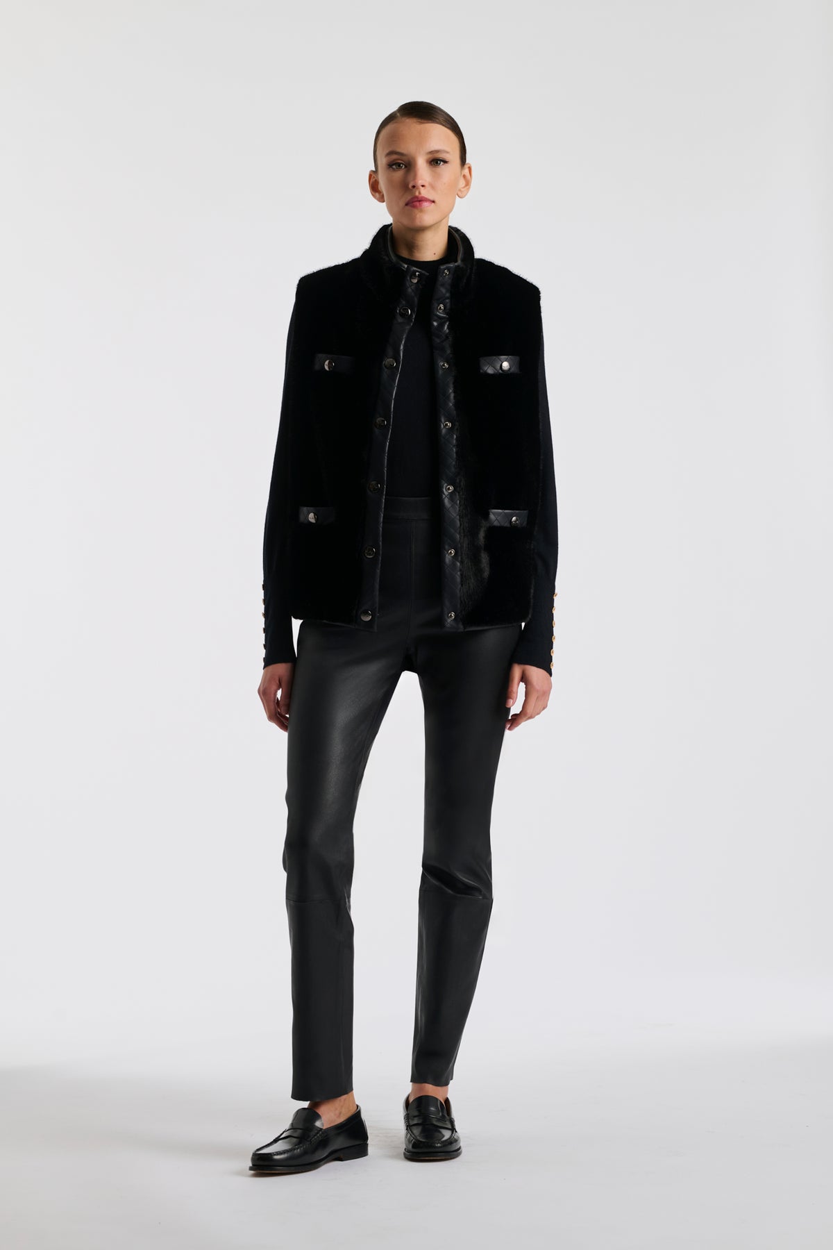 Bi-material sleeveless jacket