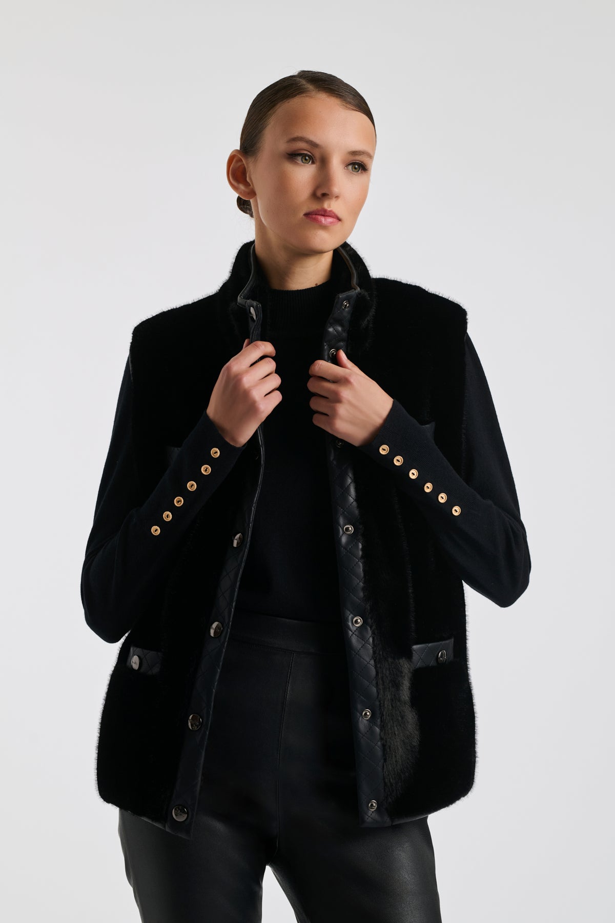 Bi-material sleeveless jacket