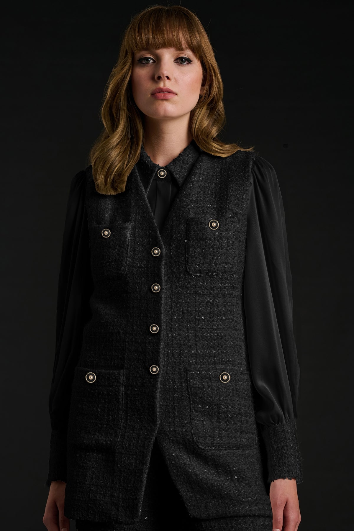 Veston en tweed sans manche