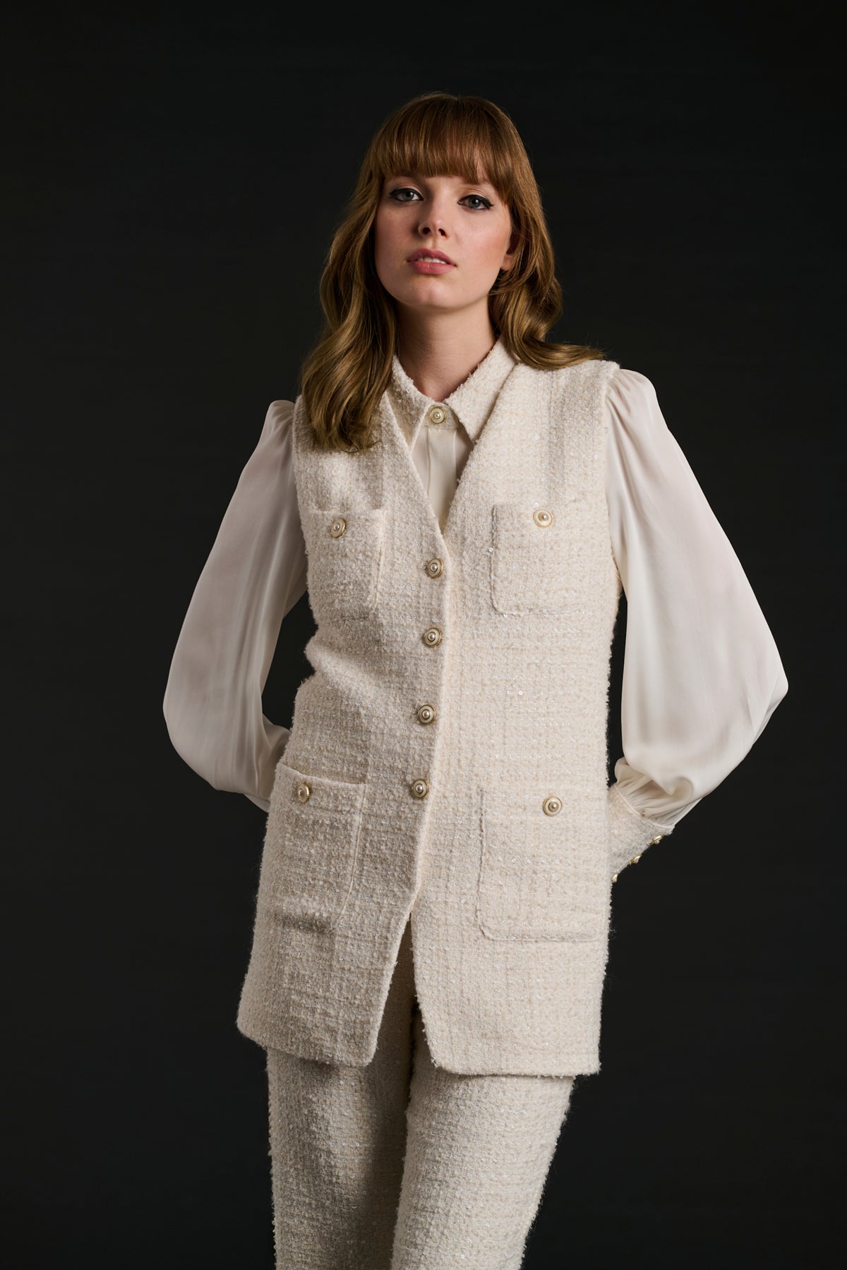 Sleeveless tweed jacket