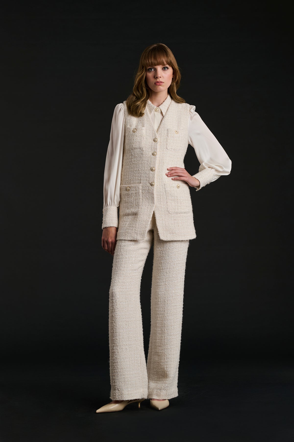 Sleeveless tweed jacket