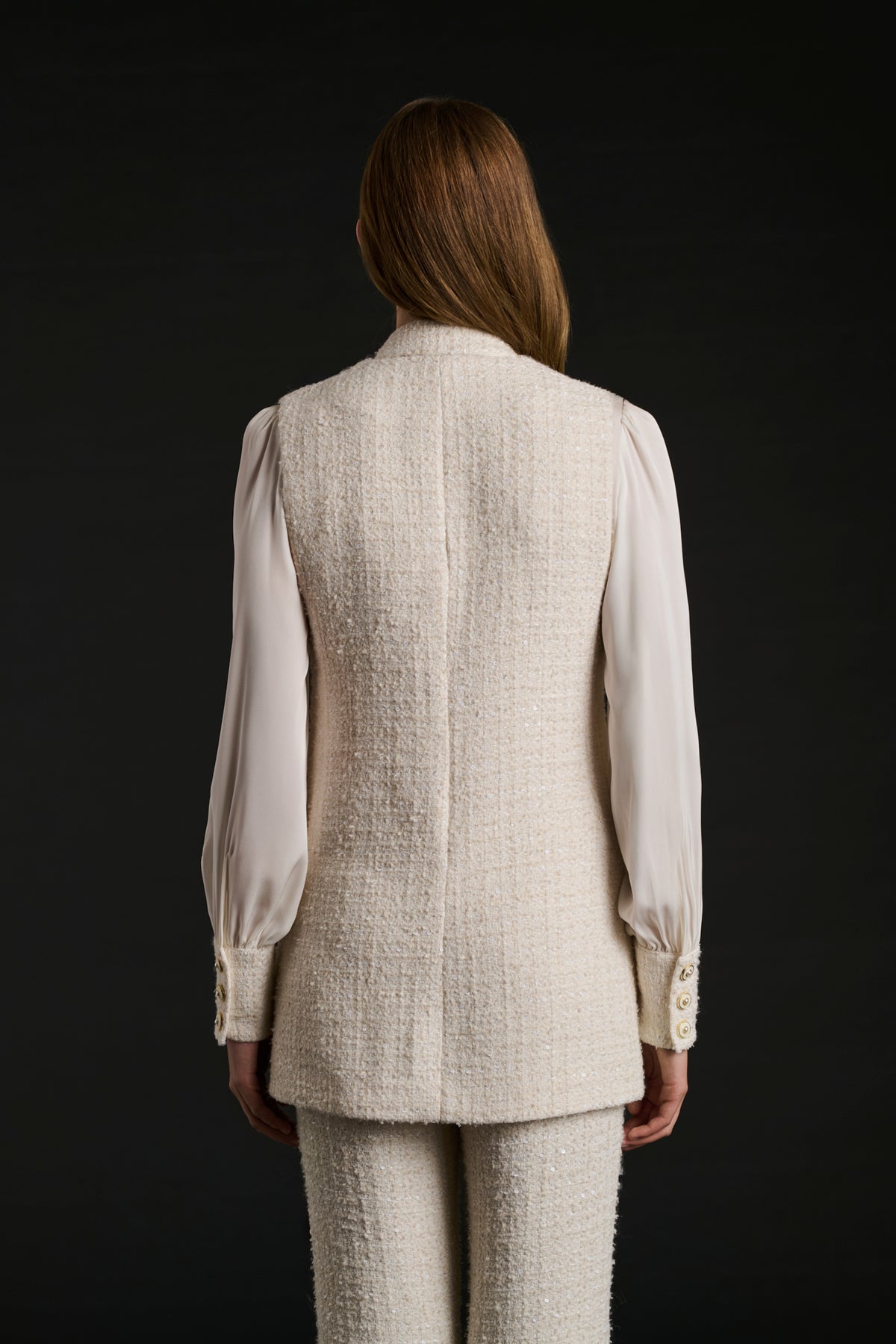 Sleeveless tweed jacket