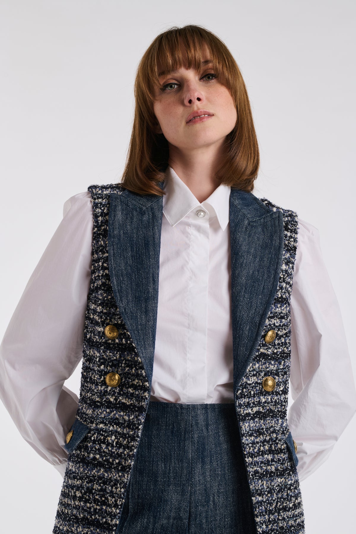 Long sleeveless jacket in tweed and denim