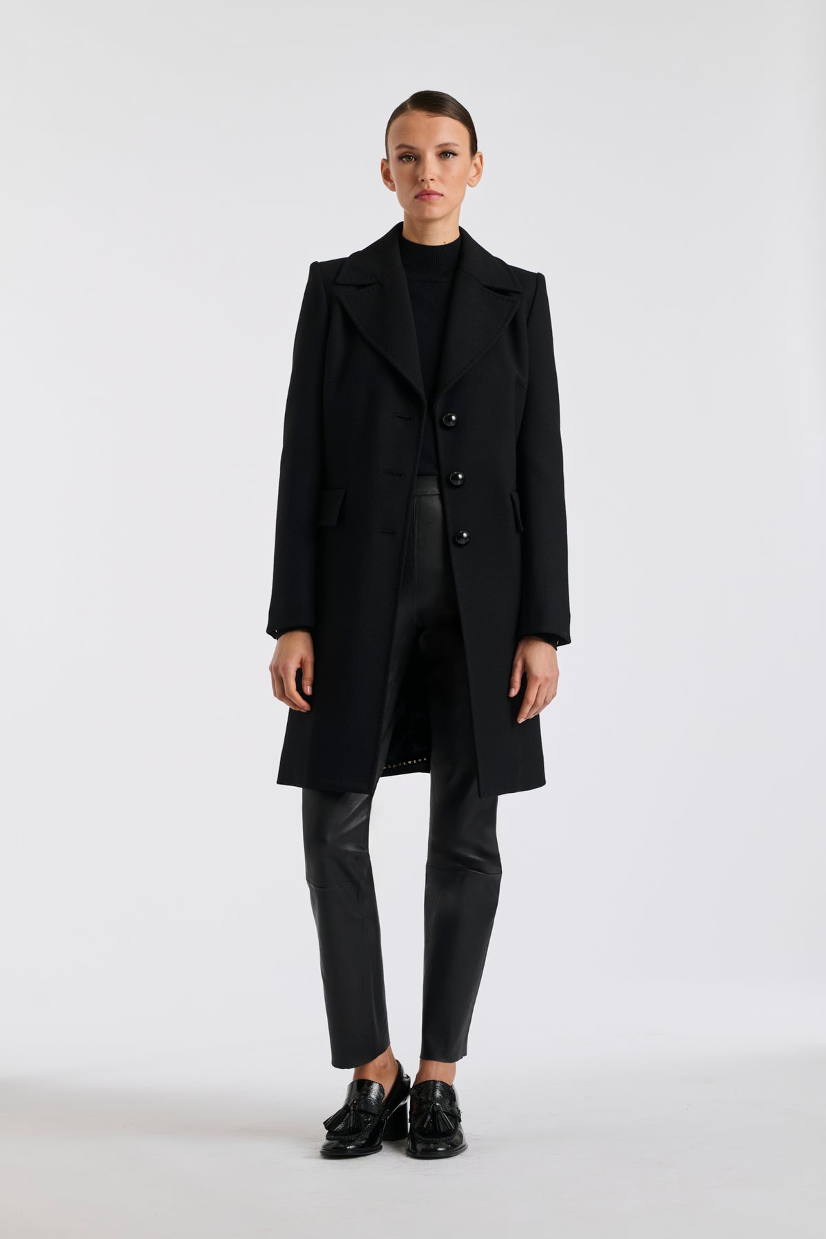 Black top-stitched wool overcoat