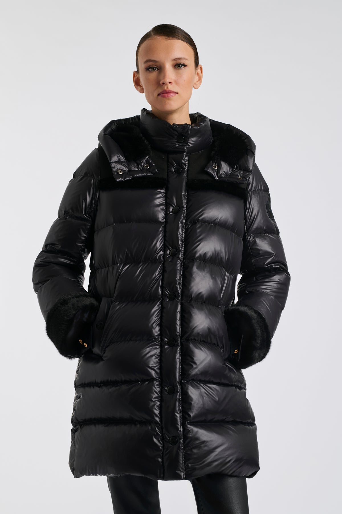 Mid-length down jacket with a fur hood