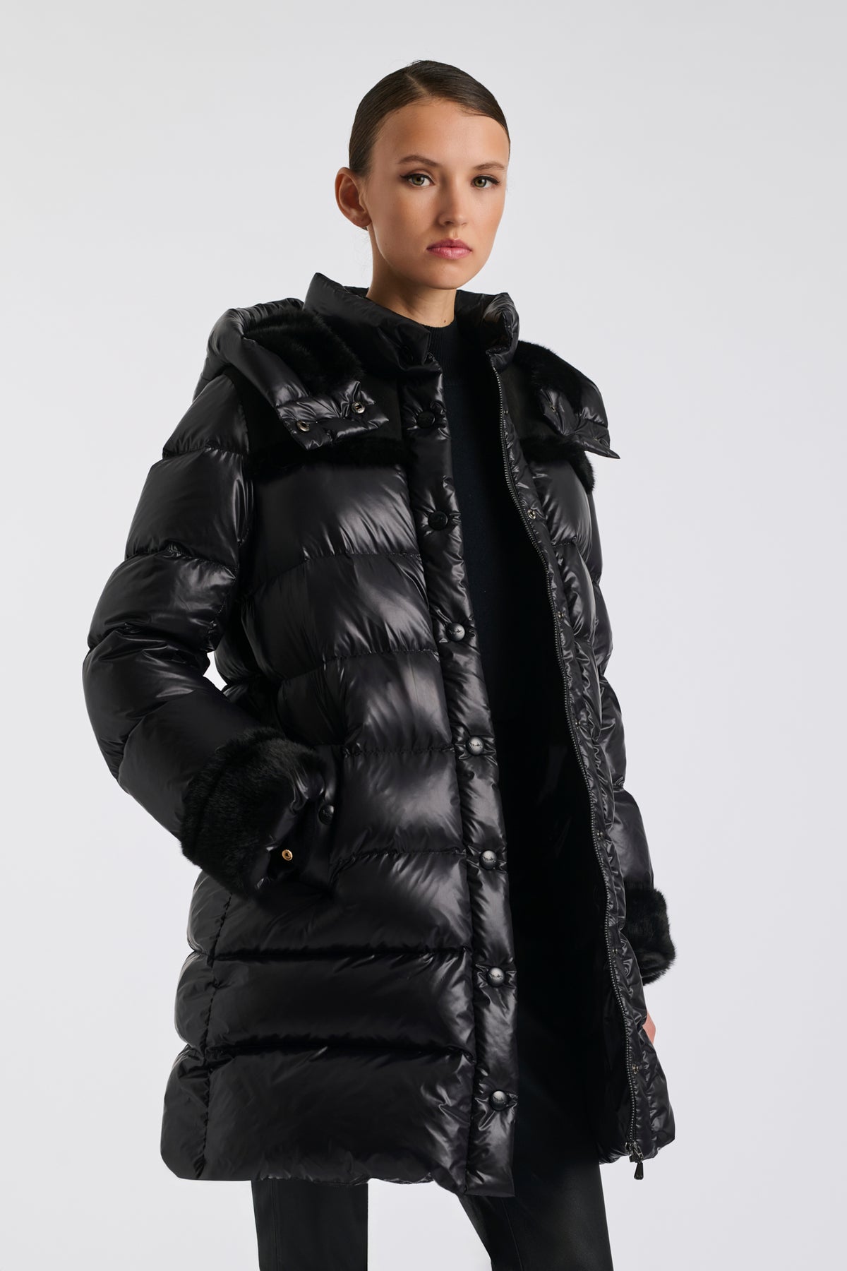 Mid-length down jacket with a fur hood