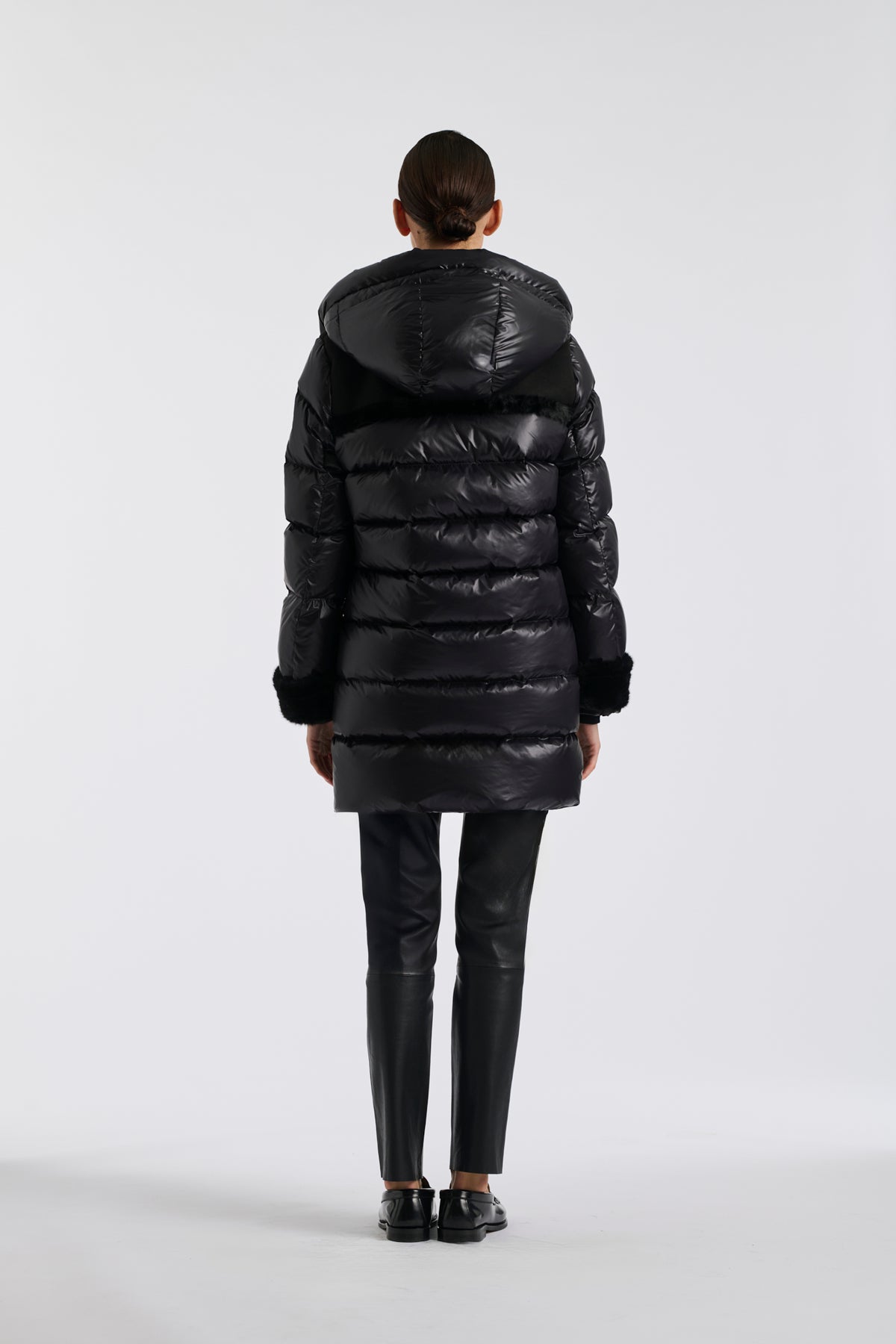 Mid-length down jacket with a fur hood