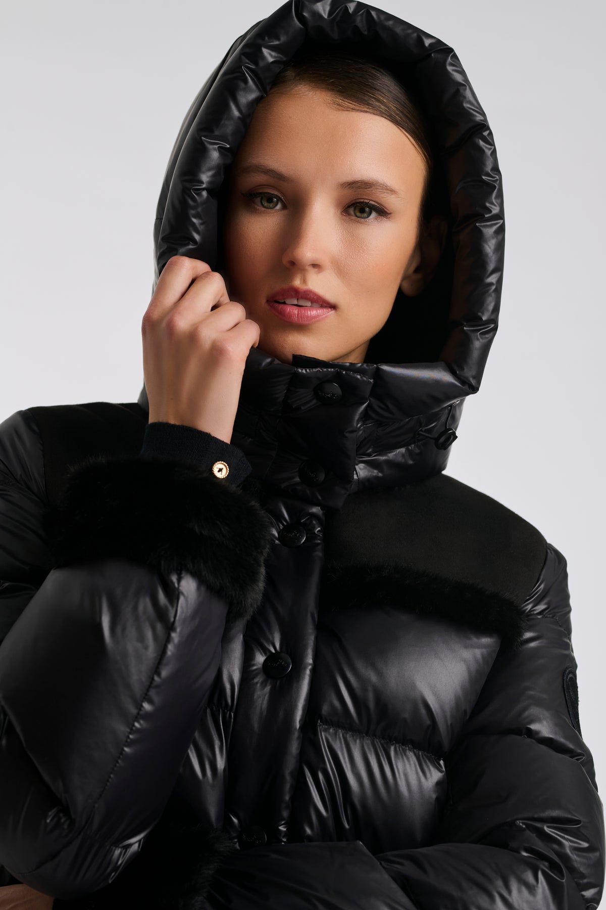 Mid-length down jacket with a fur hood