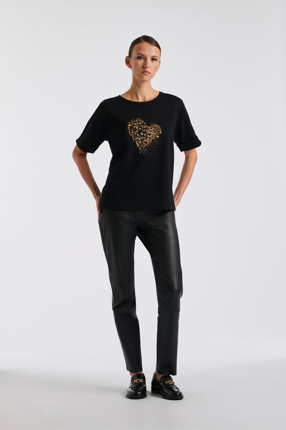 T-shirt with heart in rhinestones and studs
