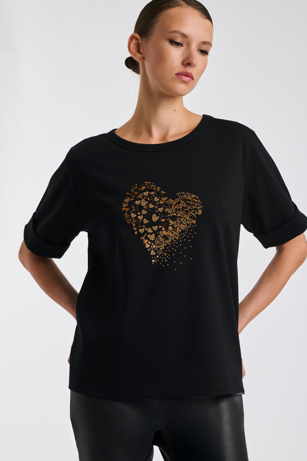 T-shirt with heart in rhinestones and studs