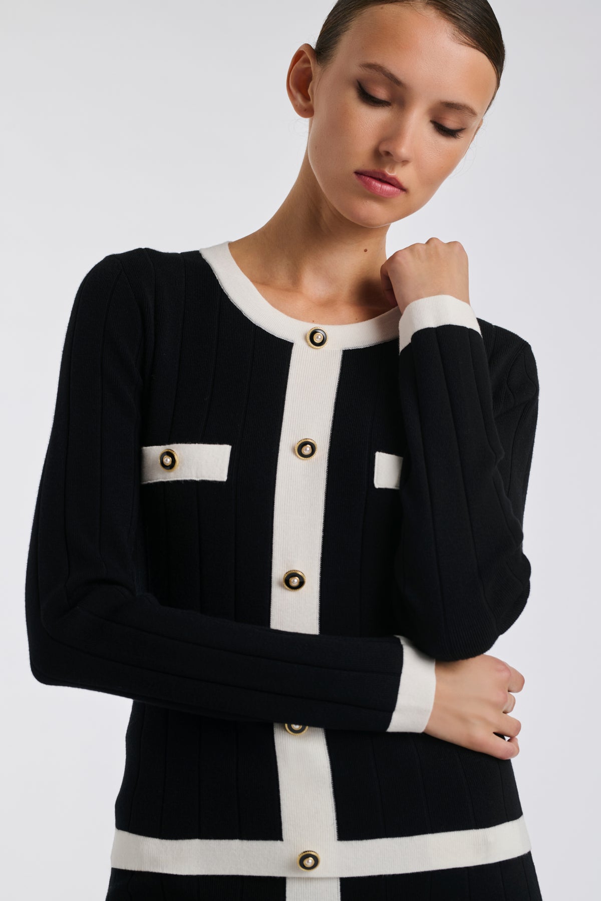 Two-tone jumper with jewelled buttons
