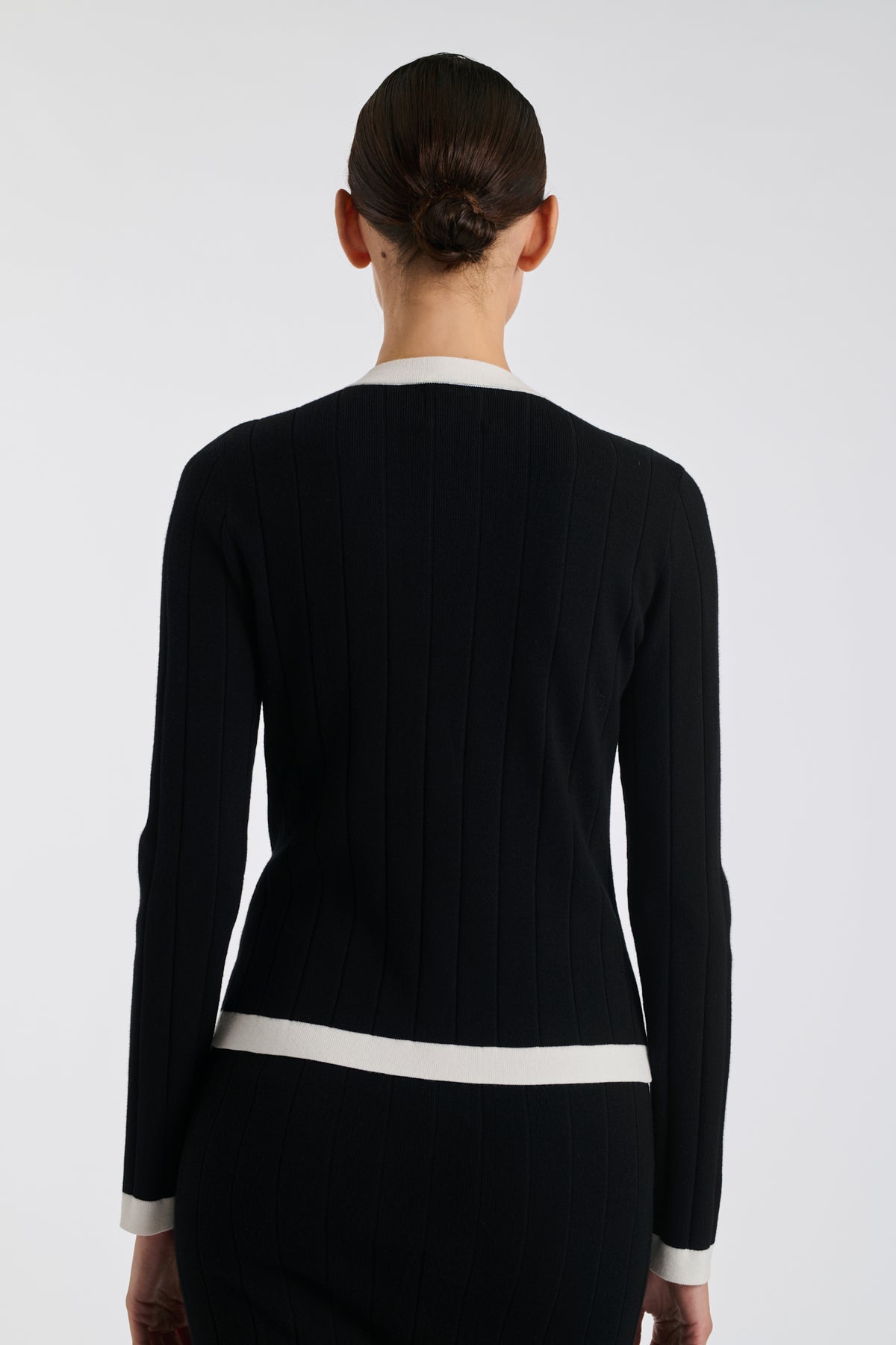 Two-tone jumper with jewelled buttons