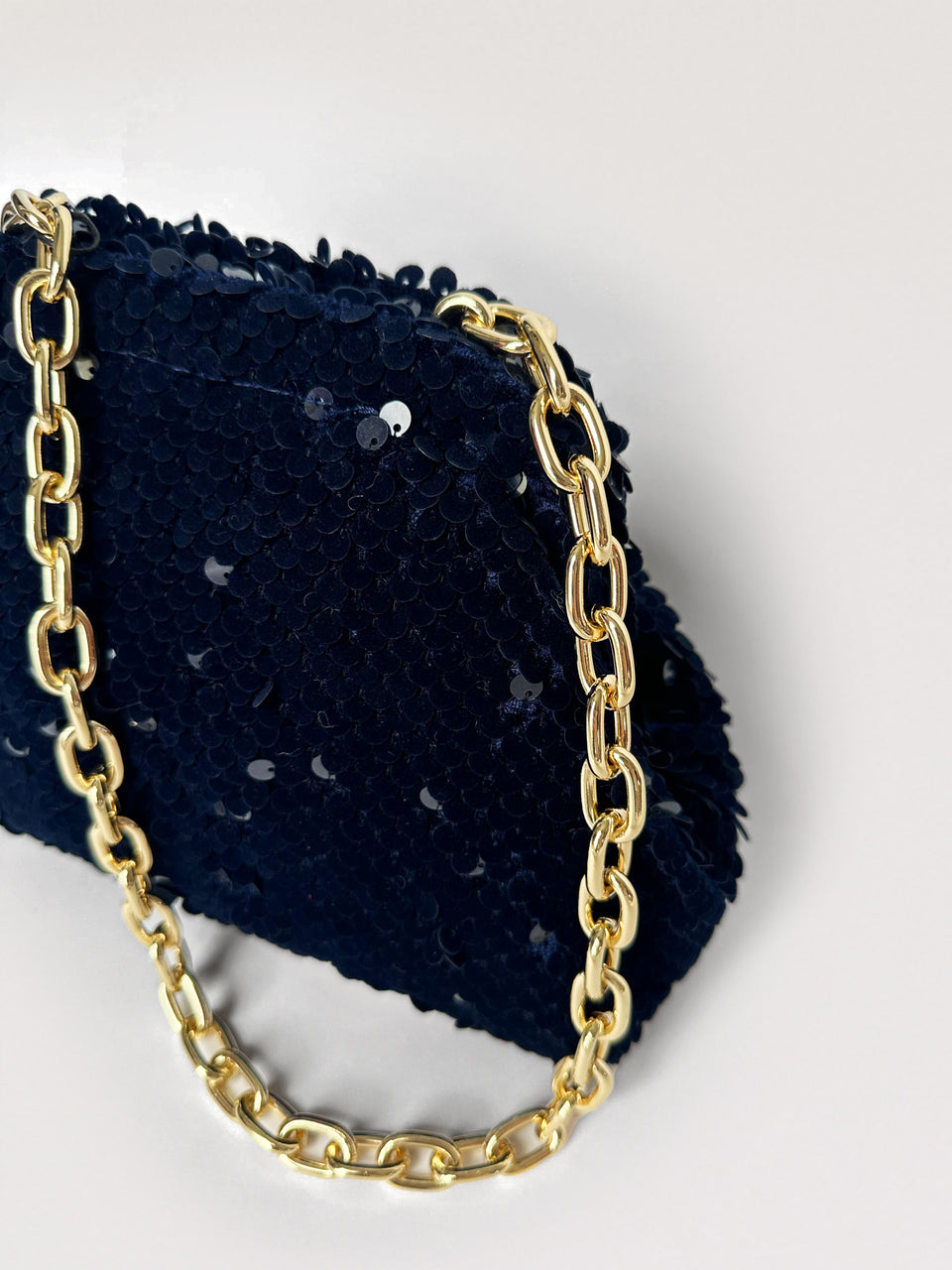 Pochette à sequins en velours