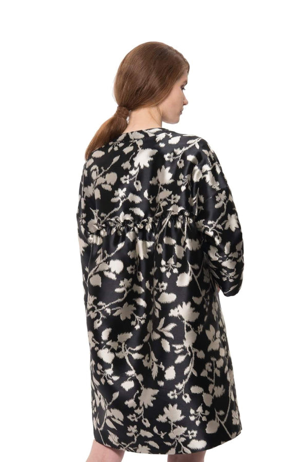 Veste longue bouffante en surbrillance