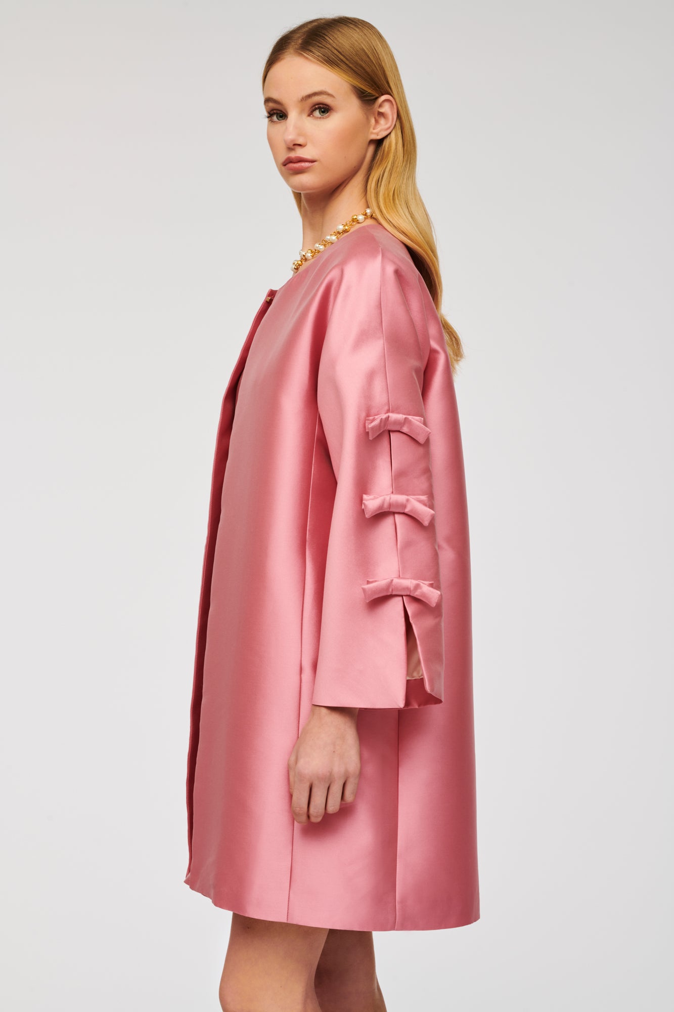 Long-sleeved jacket with bows