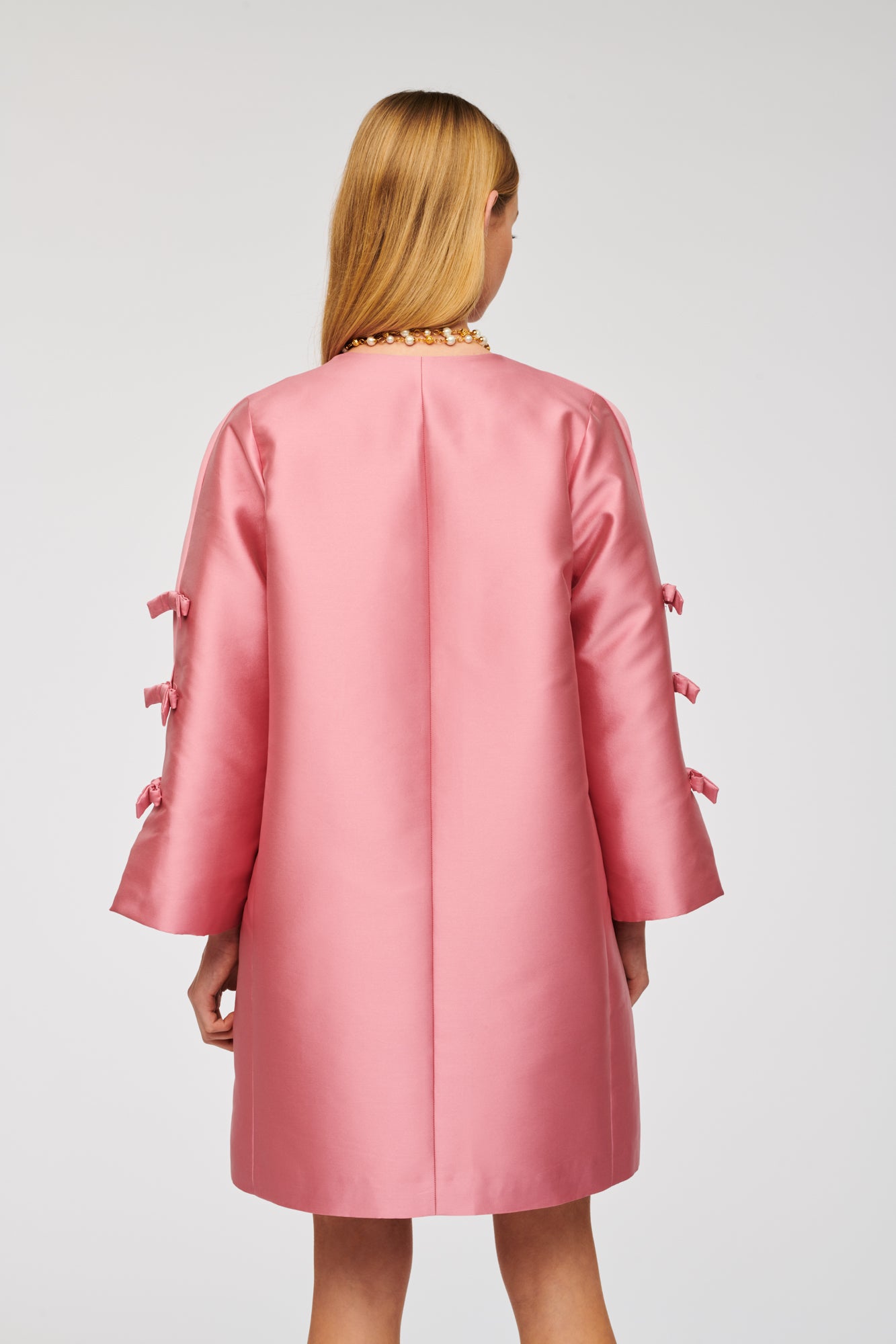 Long-sleeved jacket with bows