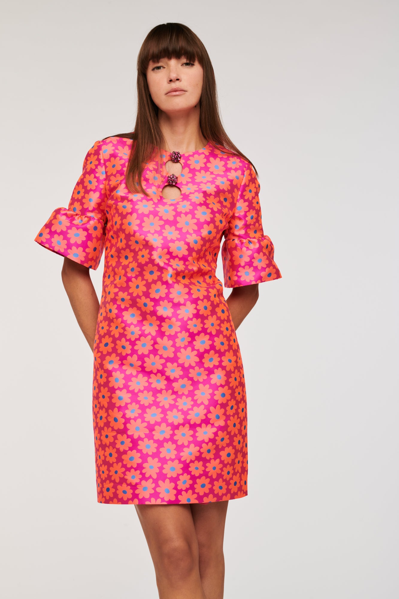 Short dress with jewellery buttons