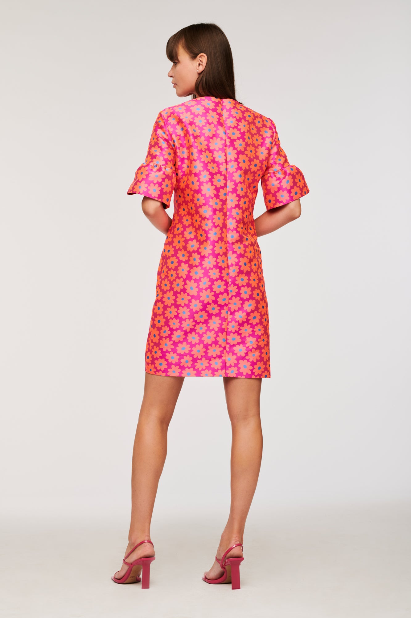 Short dress with jewellery buttons