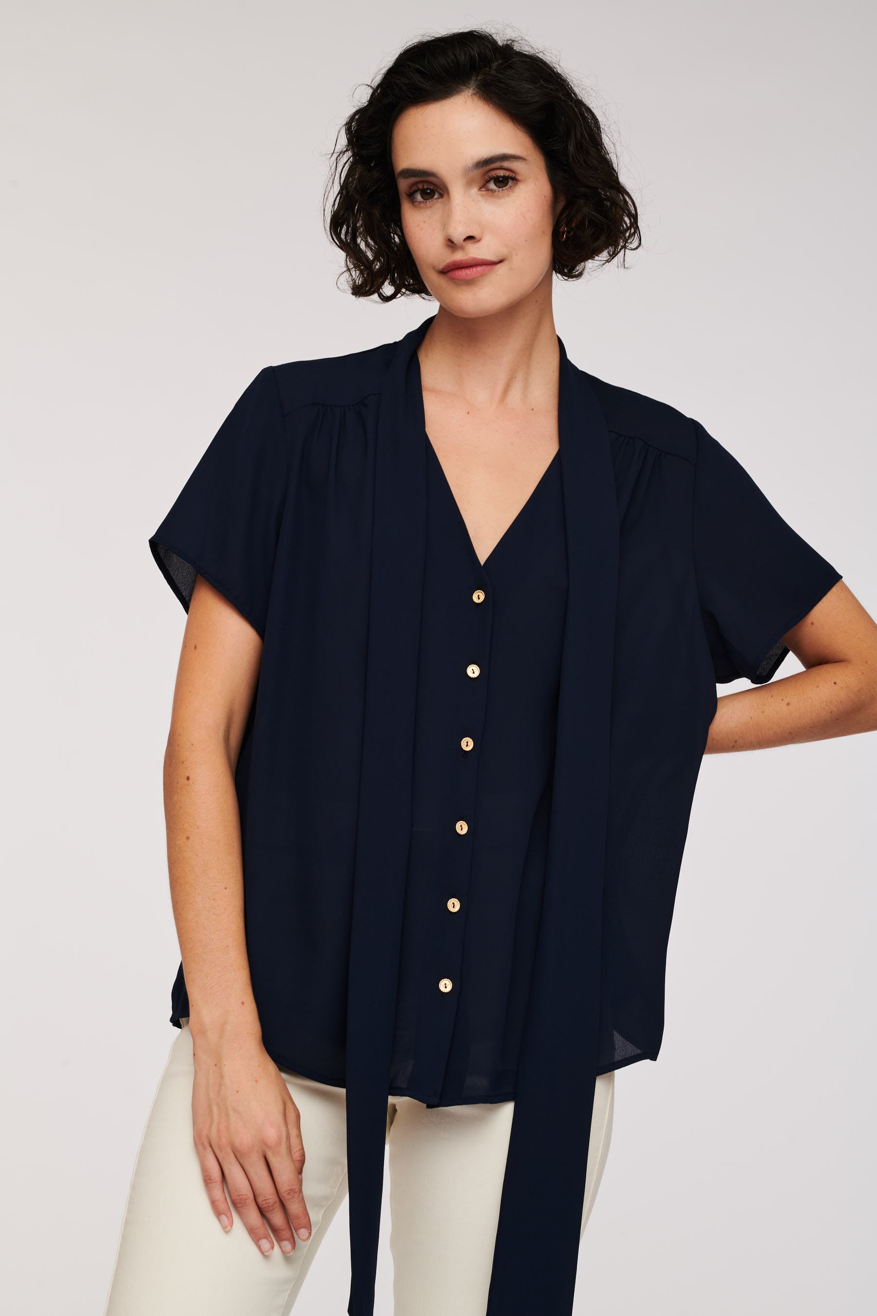 Short-sleeved pussy bow blouse