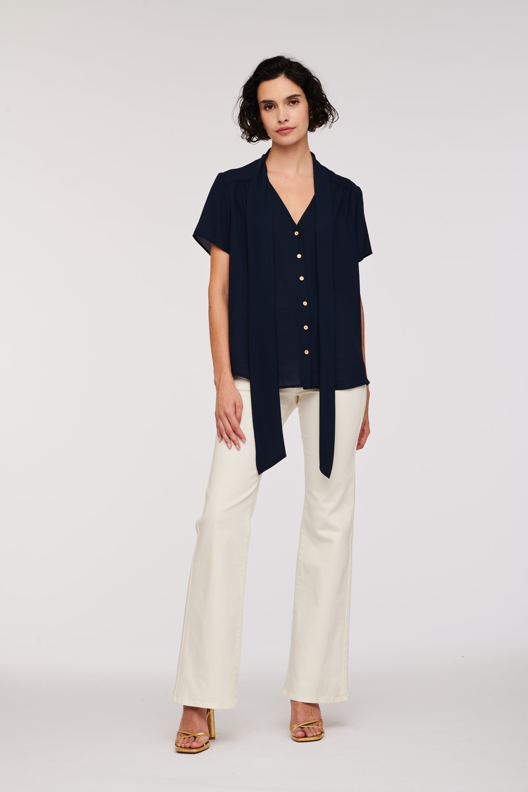 Short-sleeved pussy bow blouse