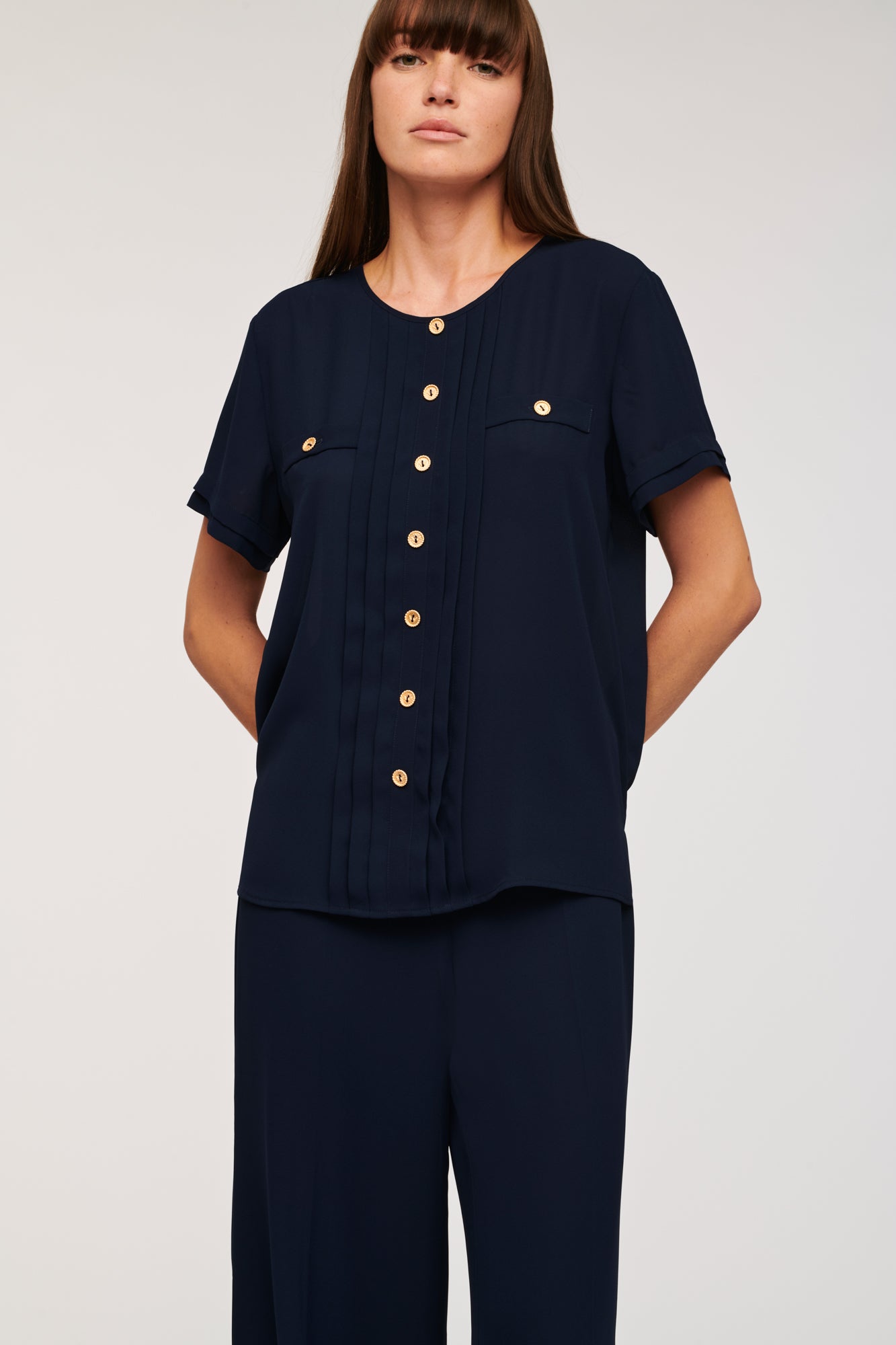 Pleated short-sleeved top