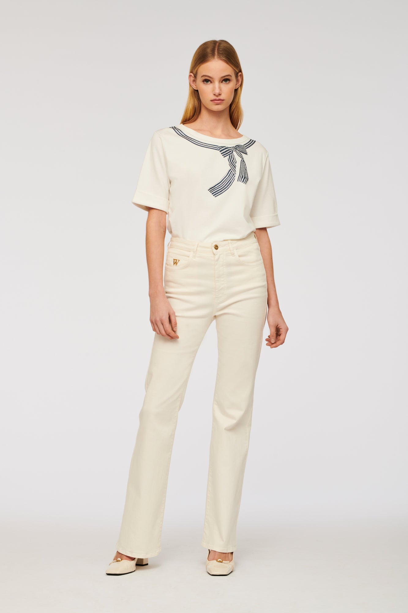 T-shirt with rhinestone bow and studs