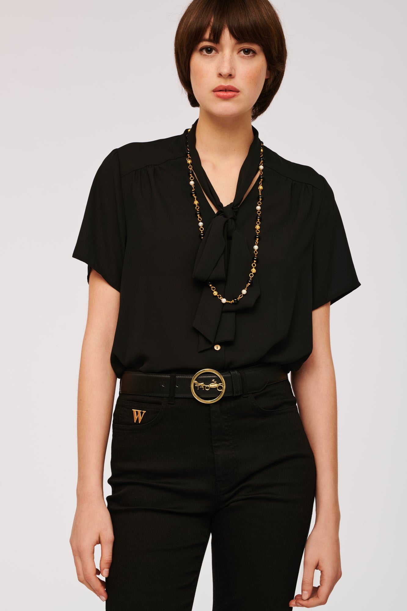 Leather belt with carriage buckle