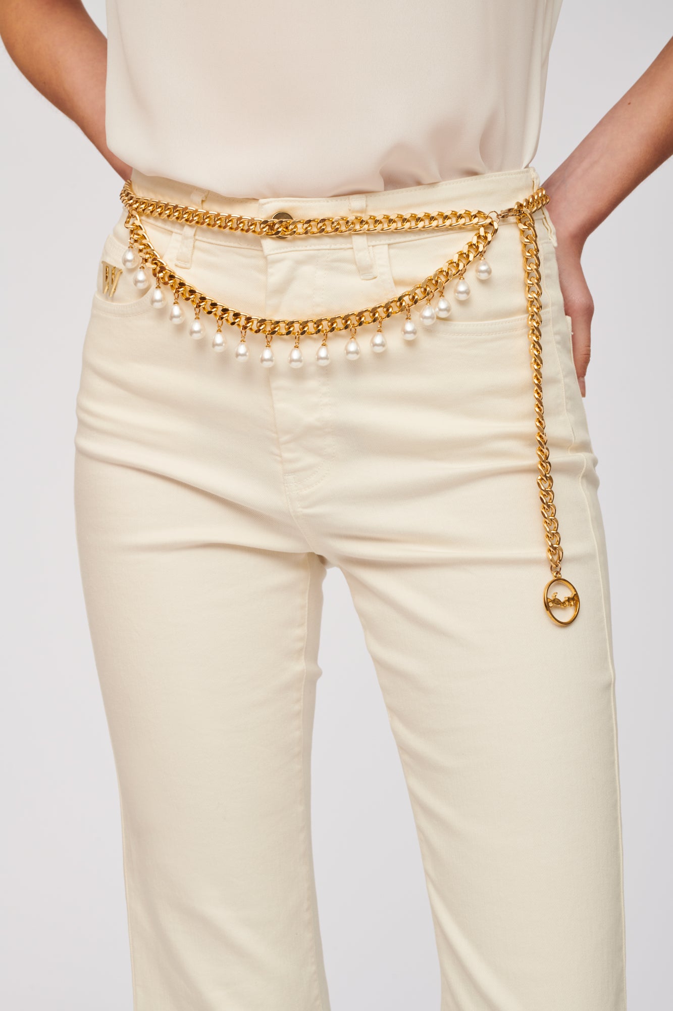 Adjustable chain belt