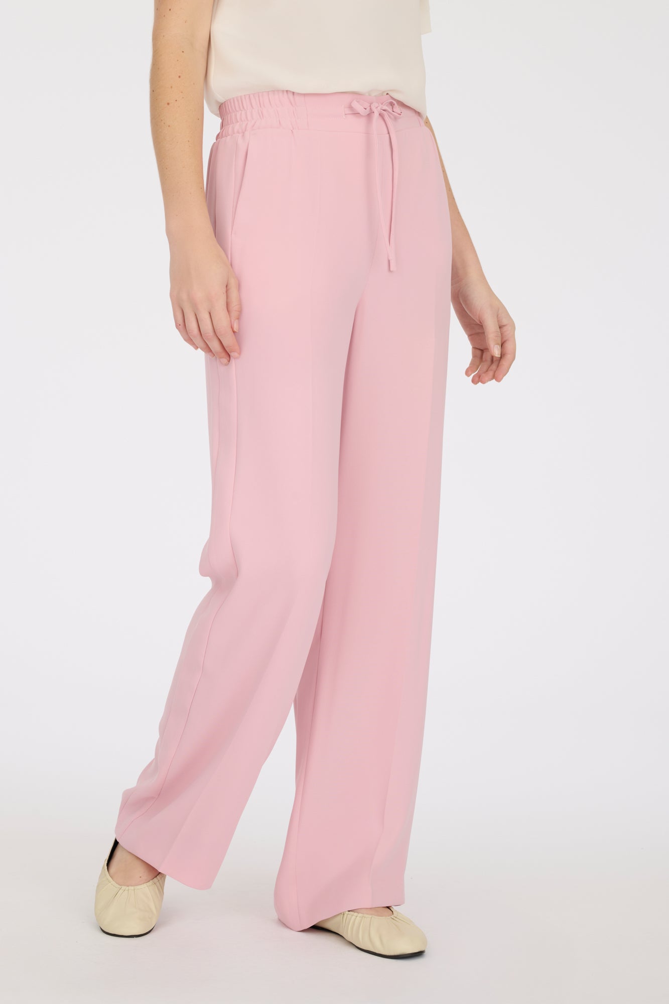 Elasticated loose fitting trousers