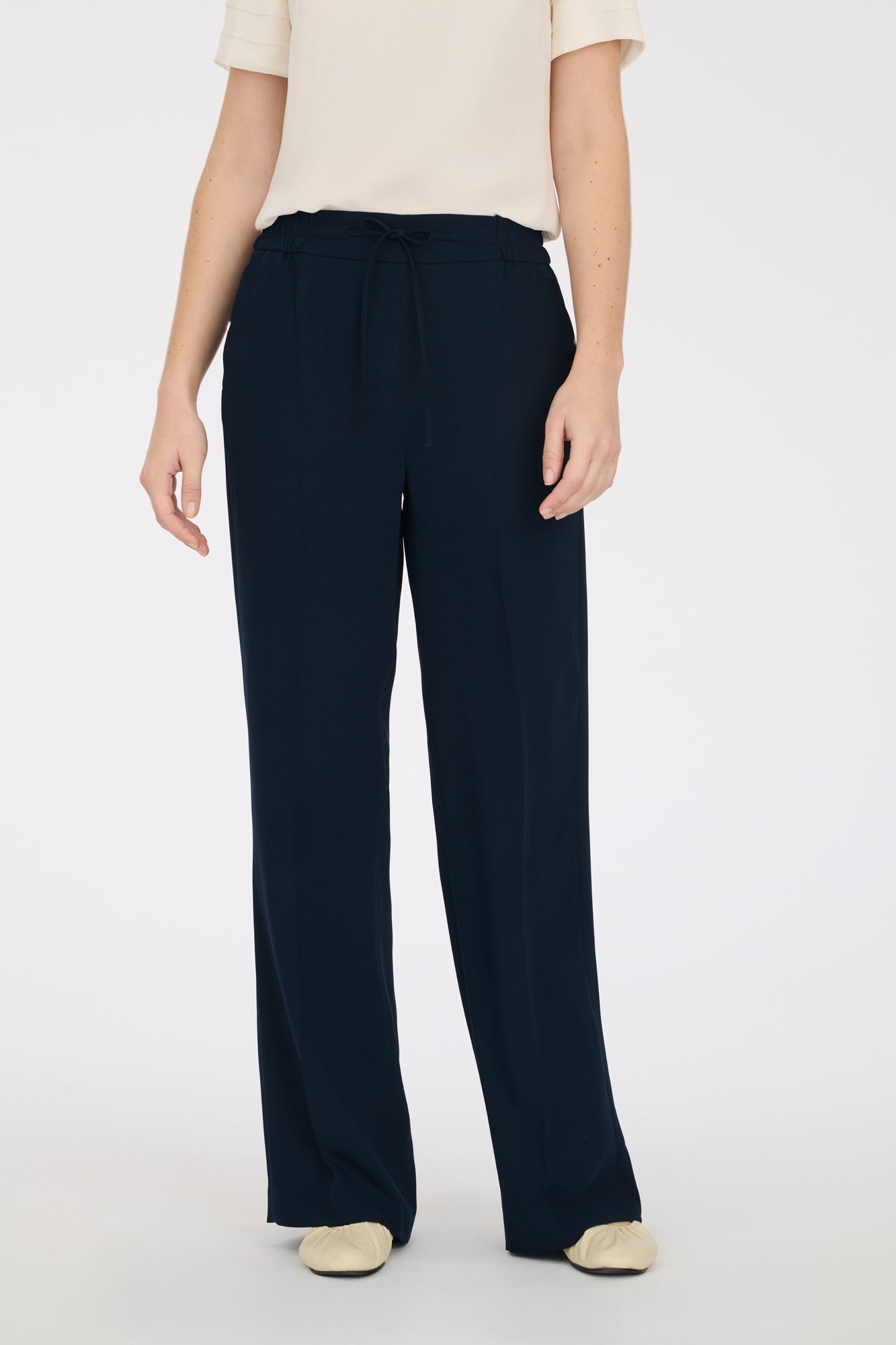 Elasticated loose fitting trousers