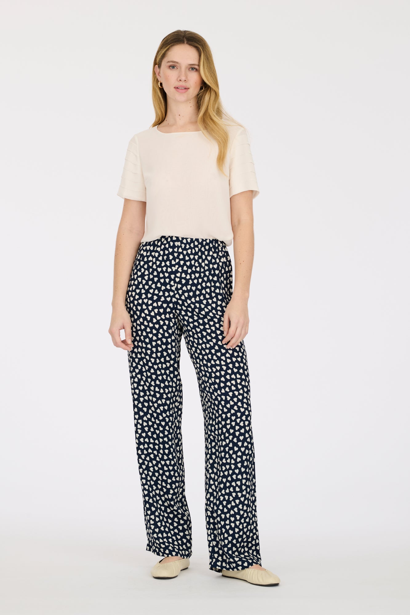 Elasticated heart-print trousers