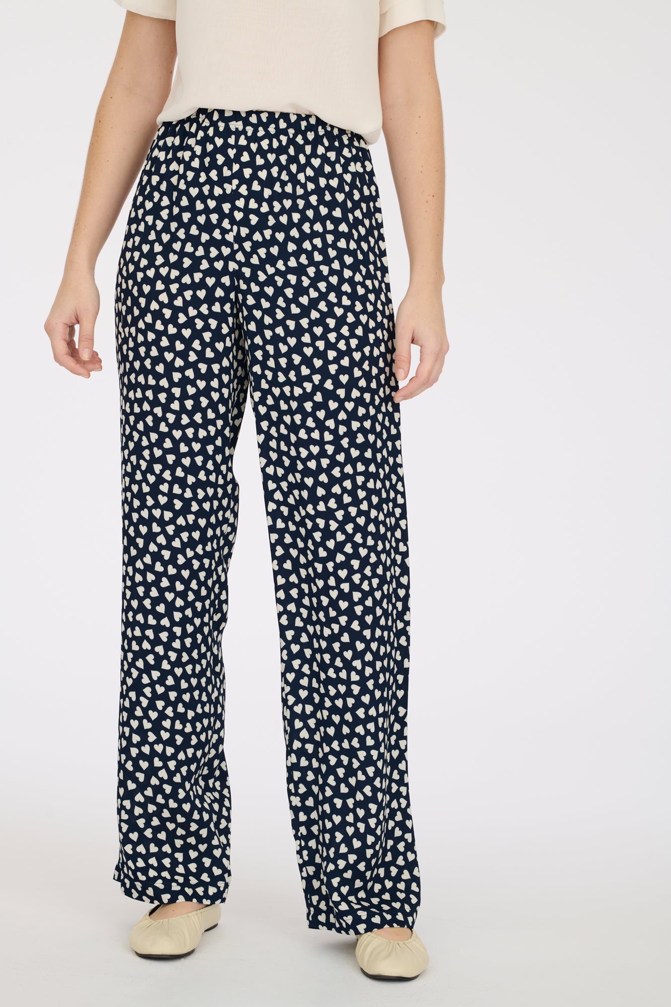 Elasticated heart-print trousers
