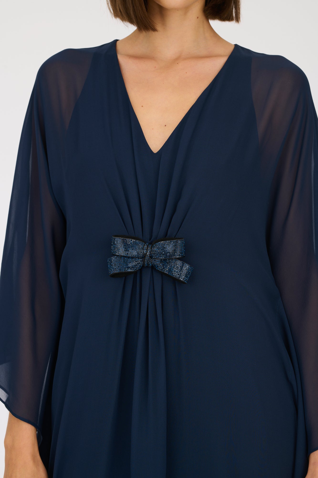 Long cocktail dress with jewelled bow