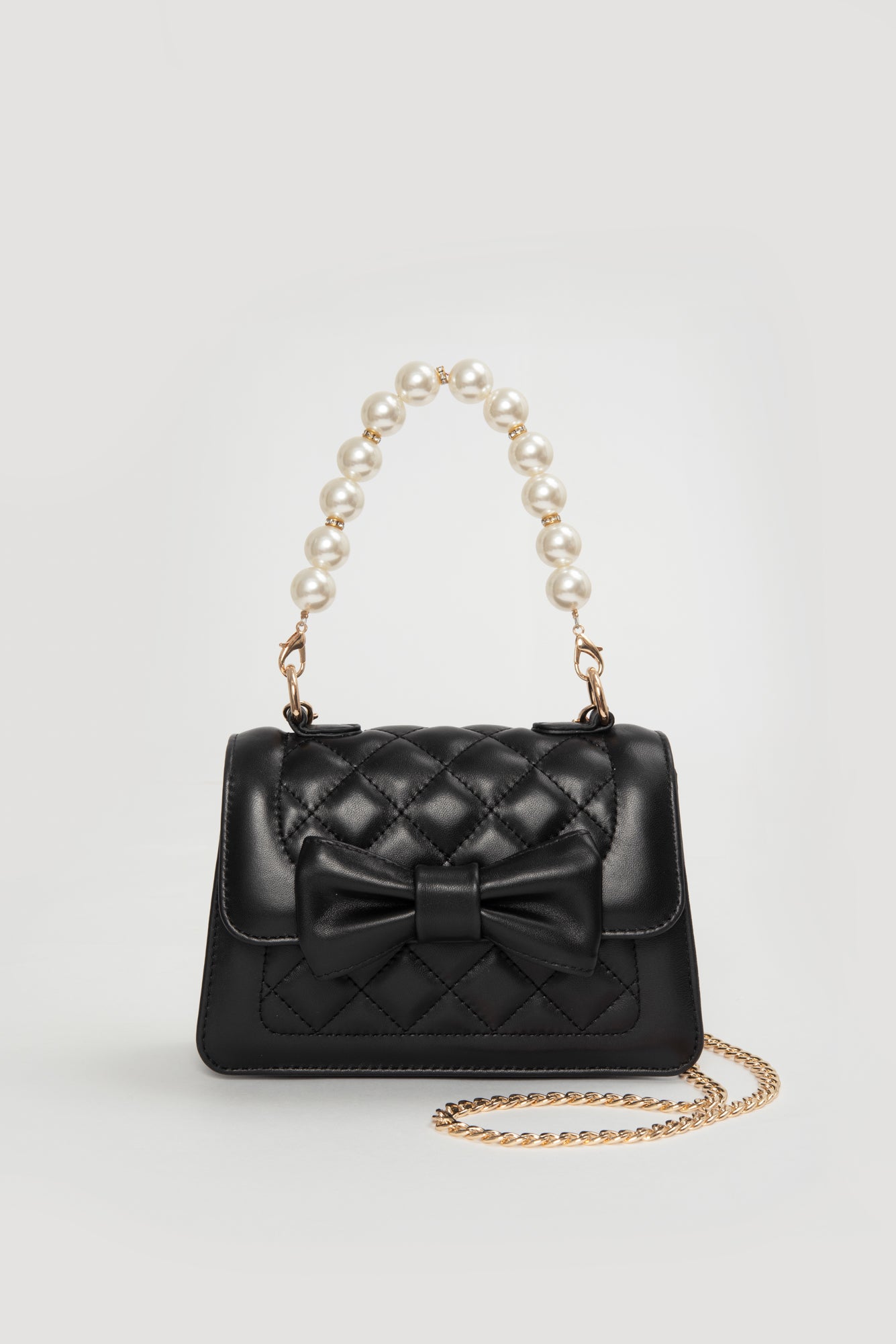 Quilted bag with bow