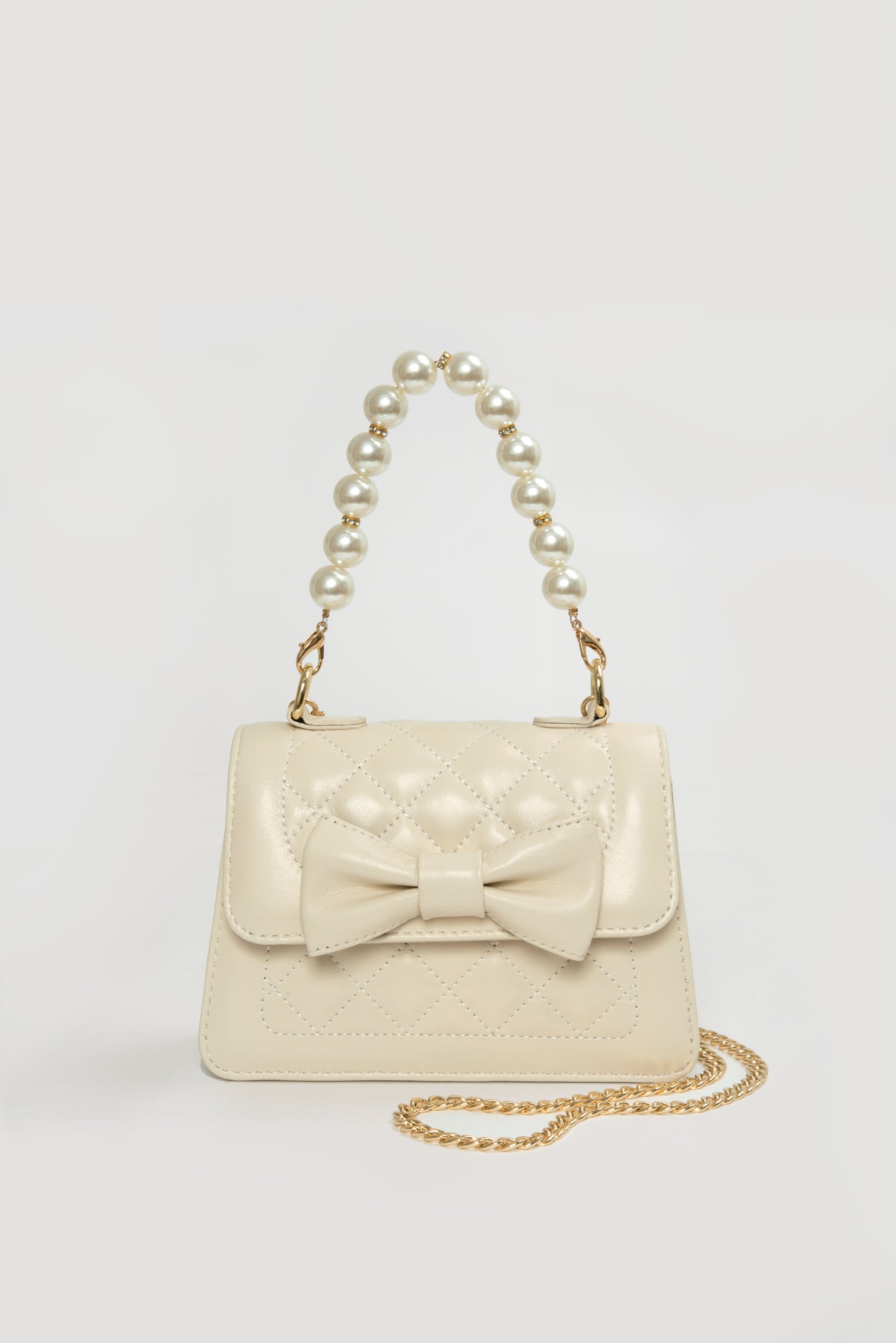 Quilted bag with bow