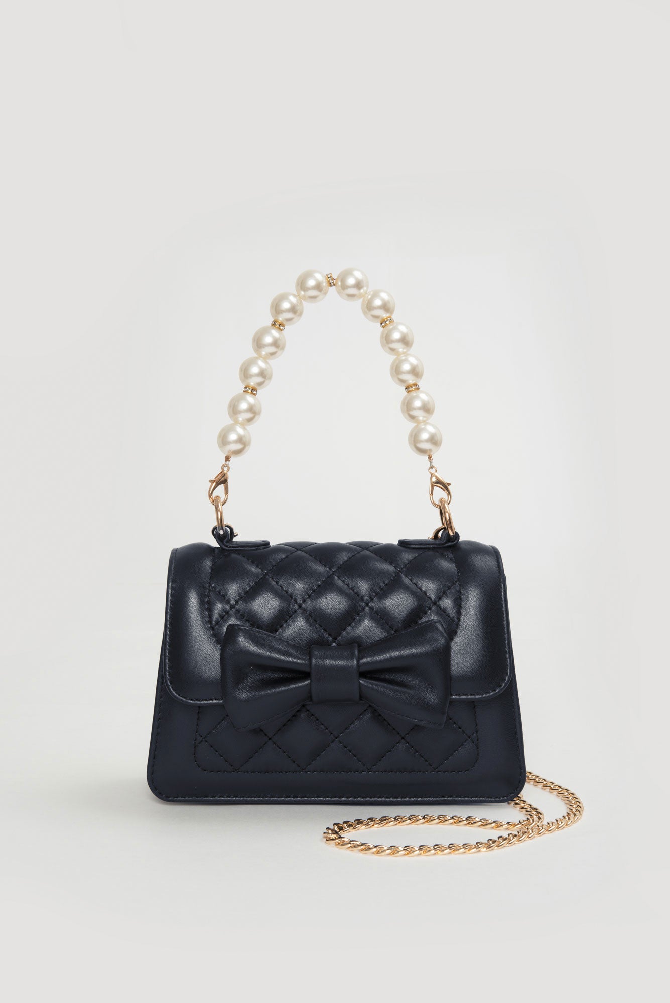 Quilted bag with bow