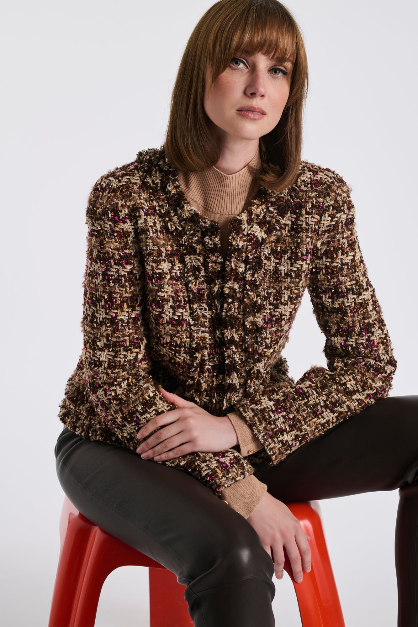 Veste en tweed à carreaux frangé