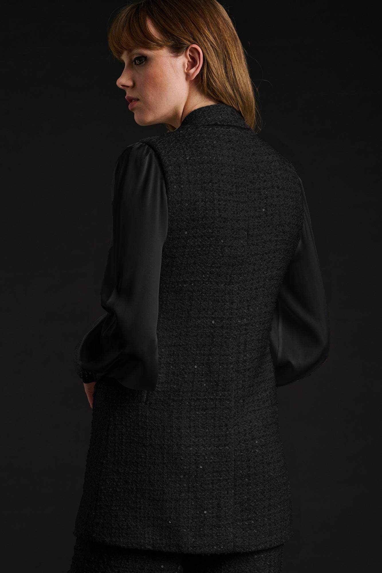 Sleeveless tweed jacket