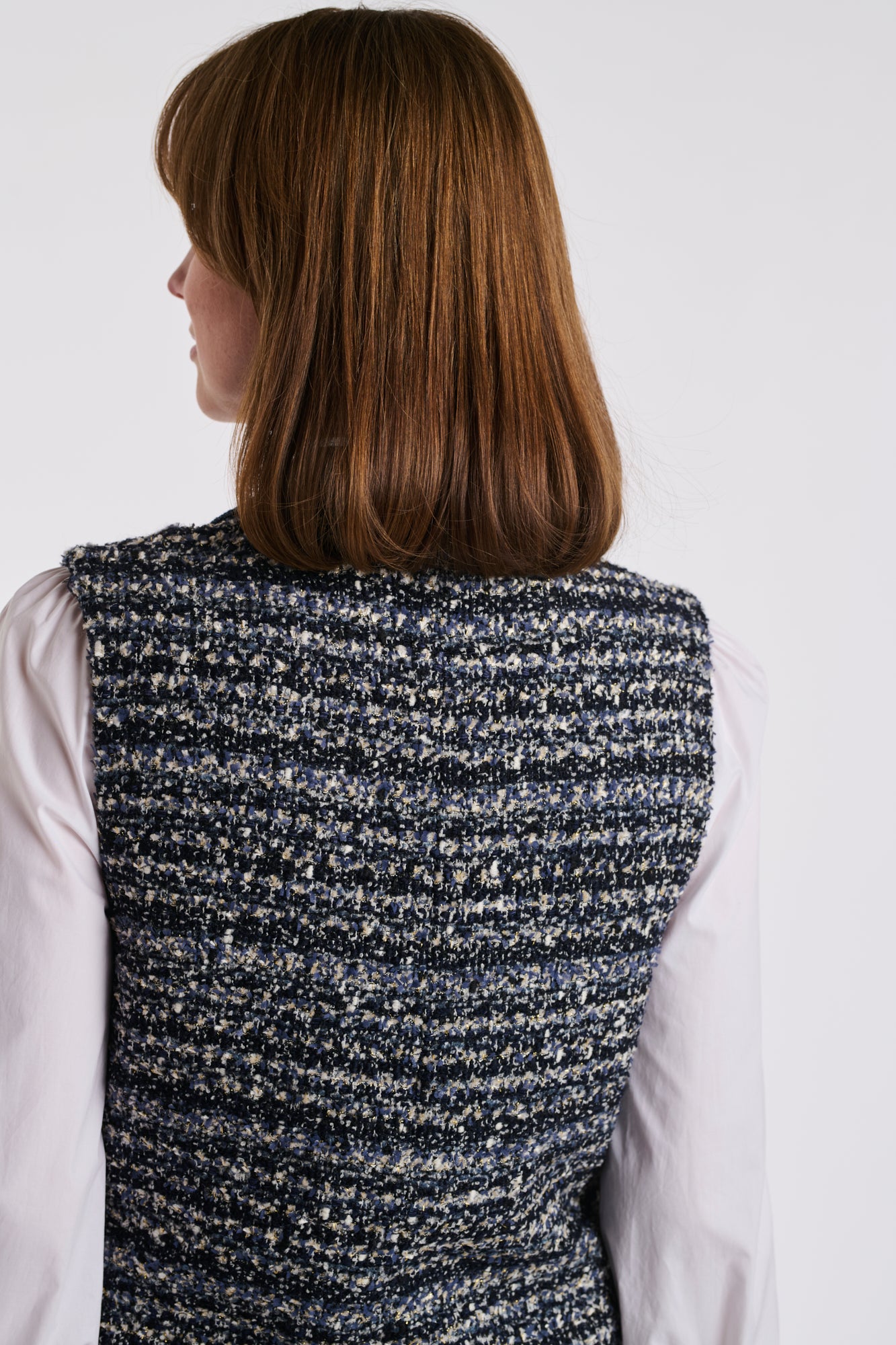 Veste longue sans manche en tweed et jean