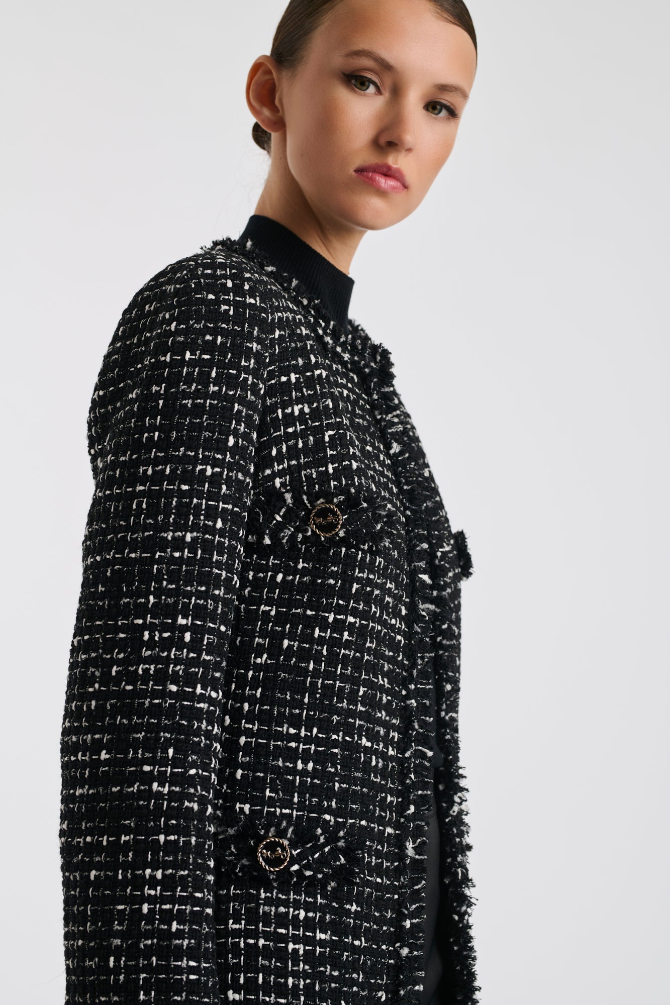 Manteau en tweed frangé