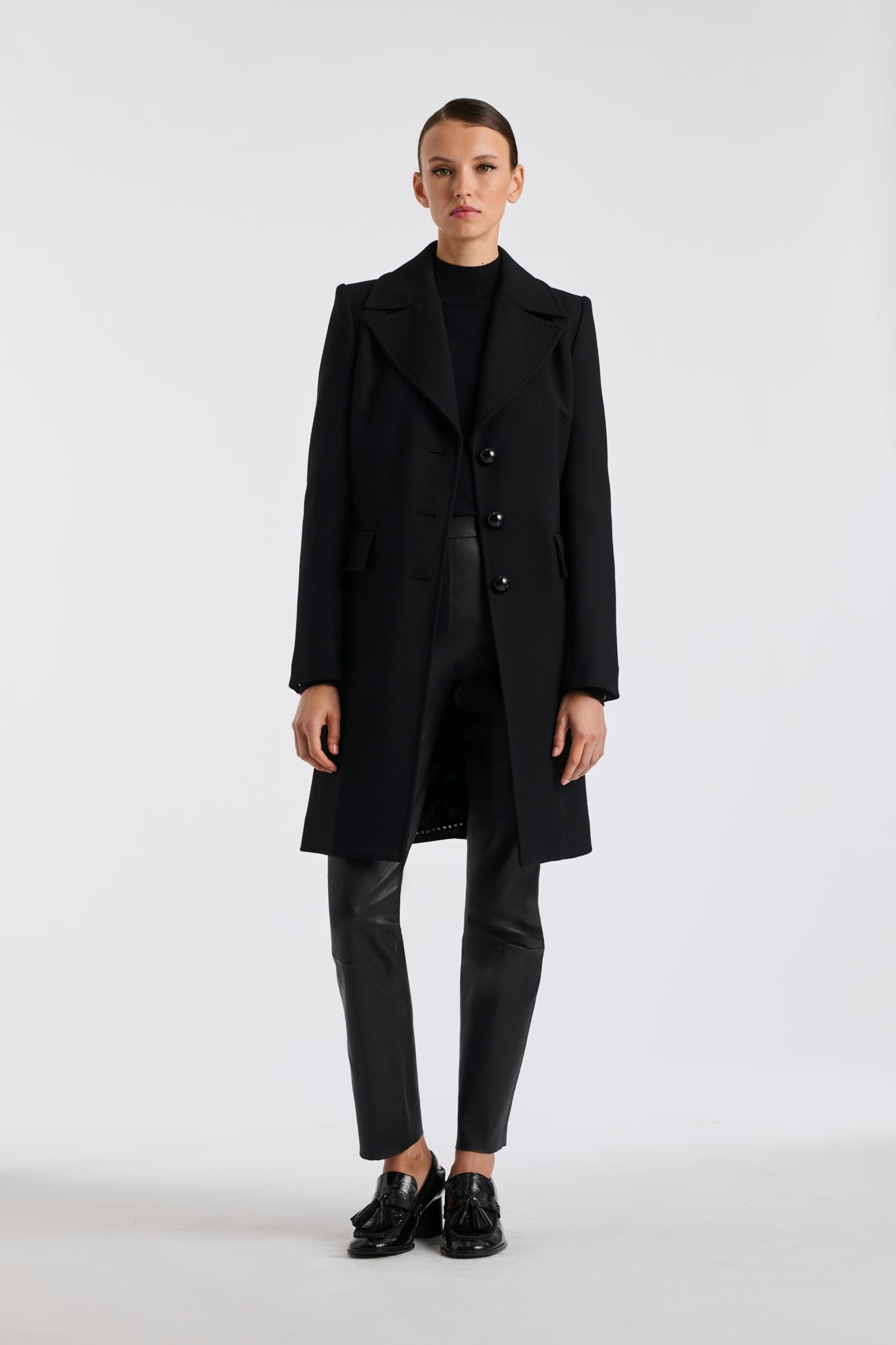 Black top-stitched wool overcoat
