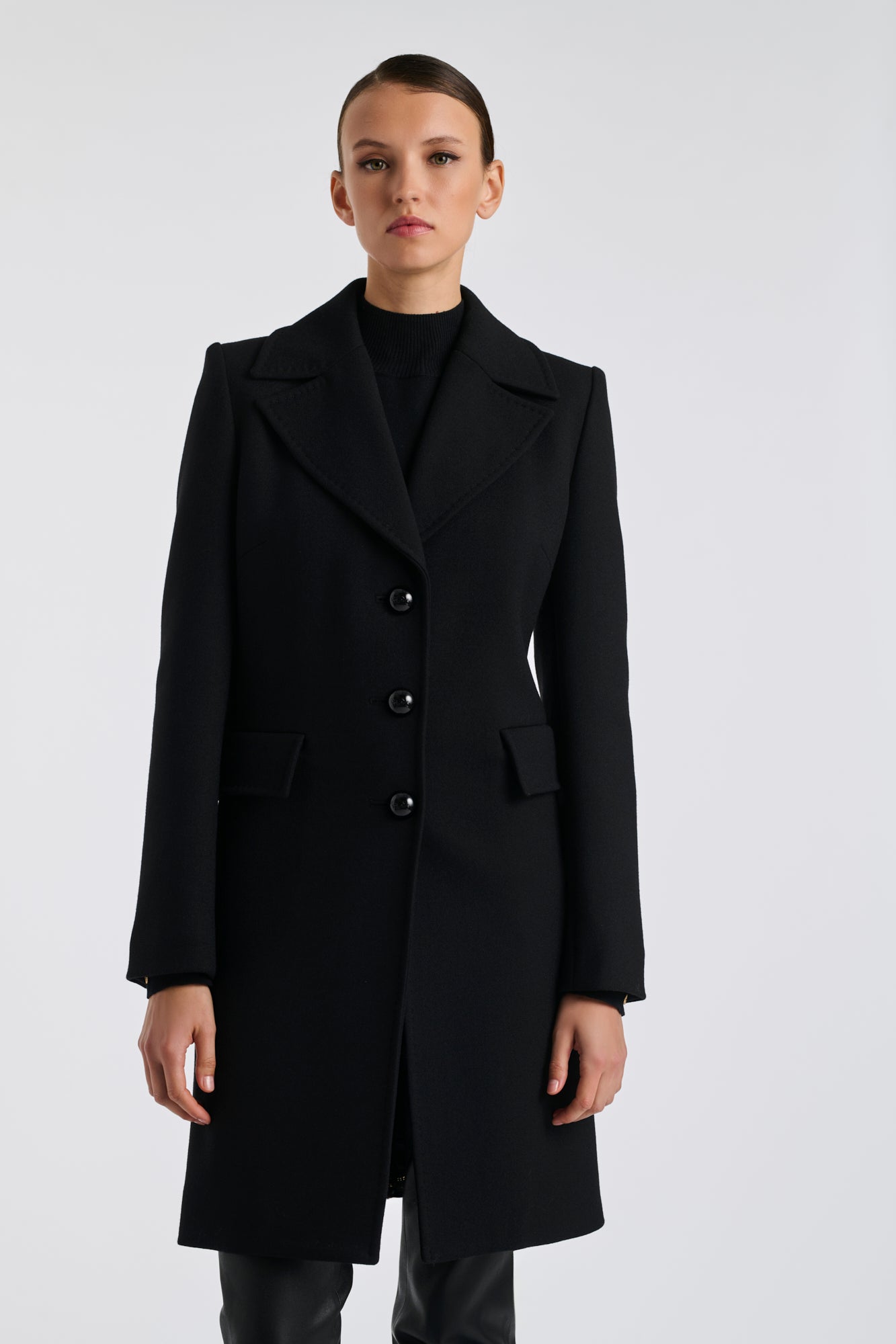 Black top-stitched wool overcoat