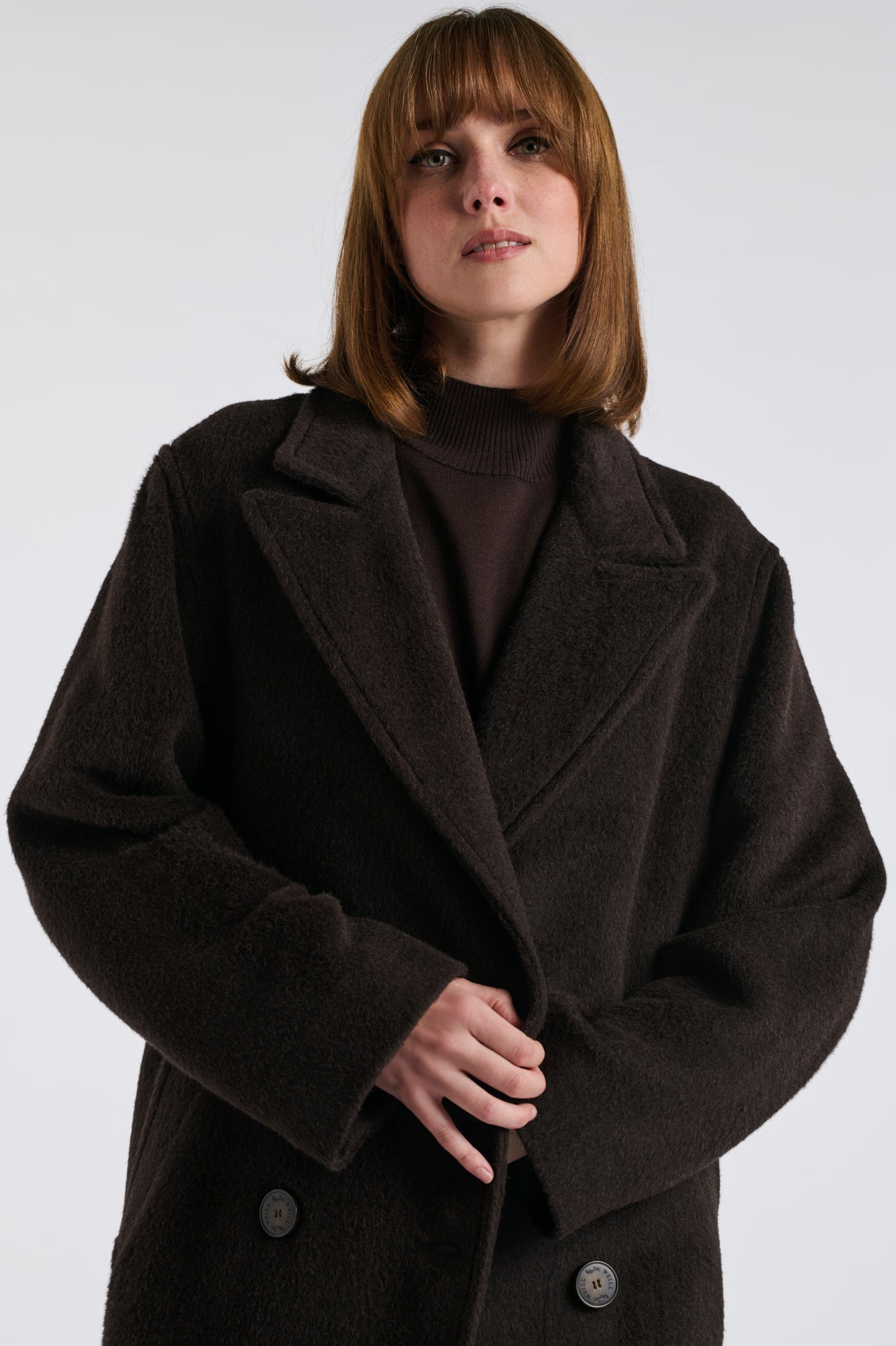 Manteau à double boutonnage en laine vierge