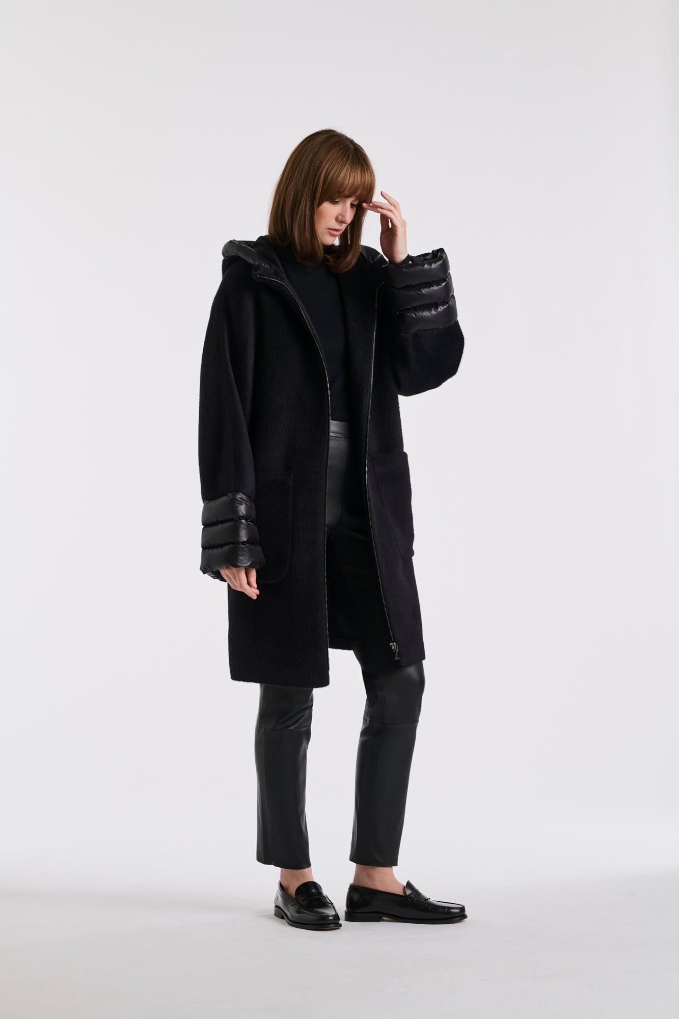 Manteau à capuche en laine vierge matelassé