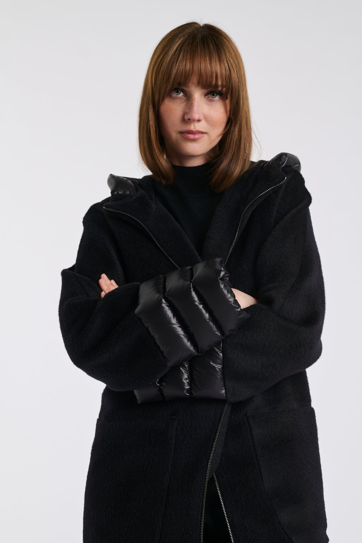 Manteau à capuche en laine vierge matelassé