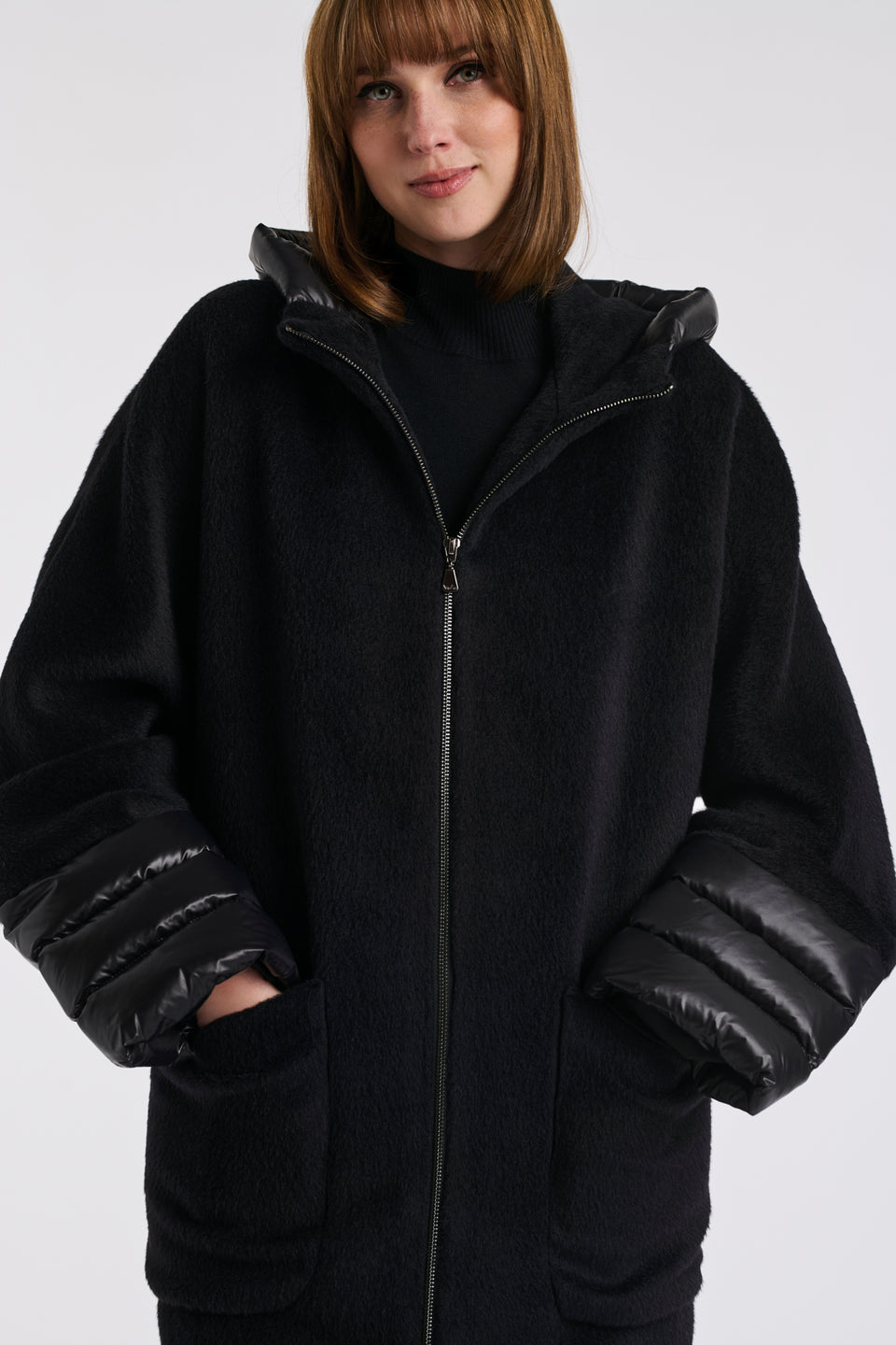 Manteau à capuche en laine vierge matelassé