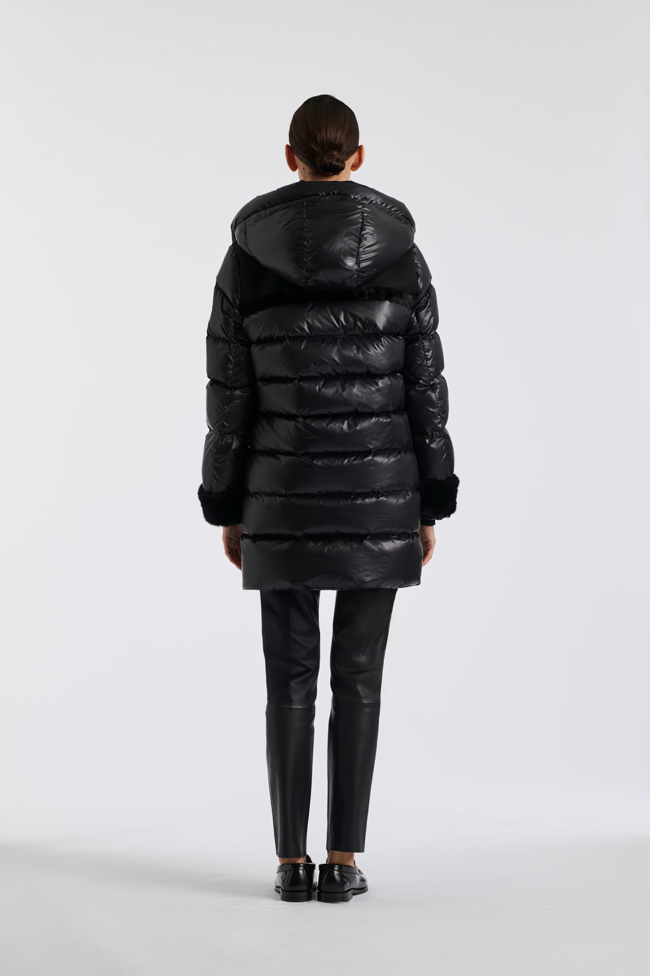 Mid-length down jacket with a fur hood