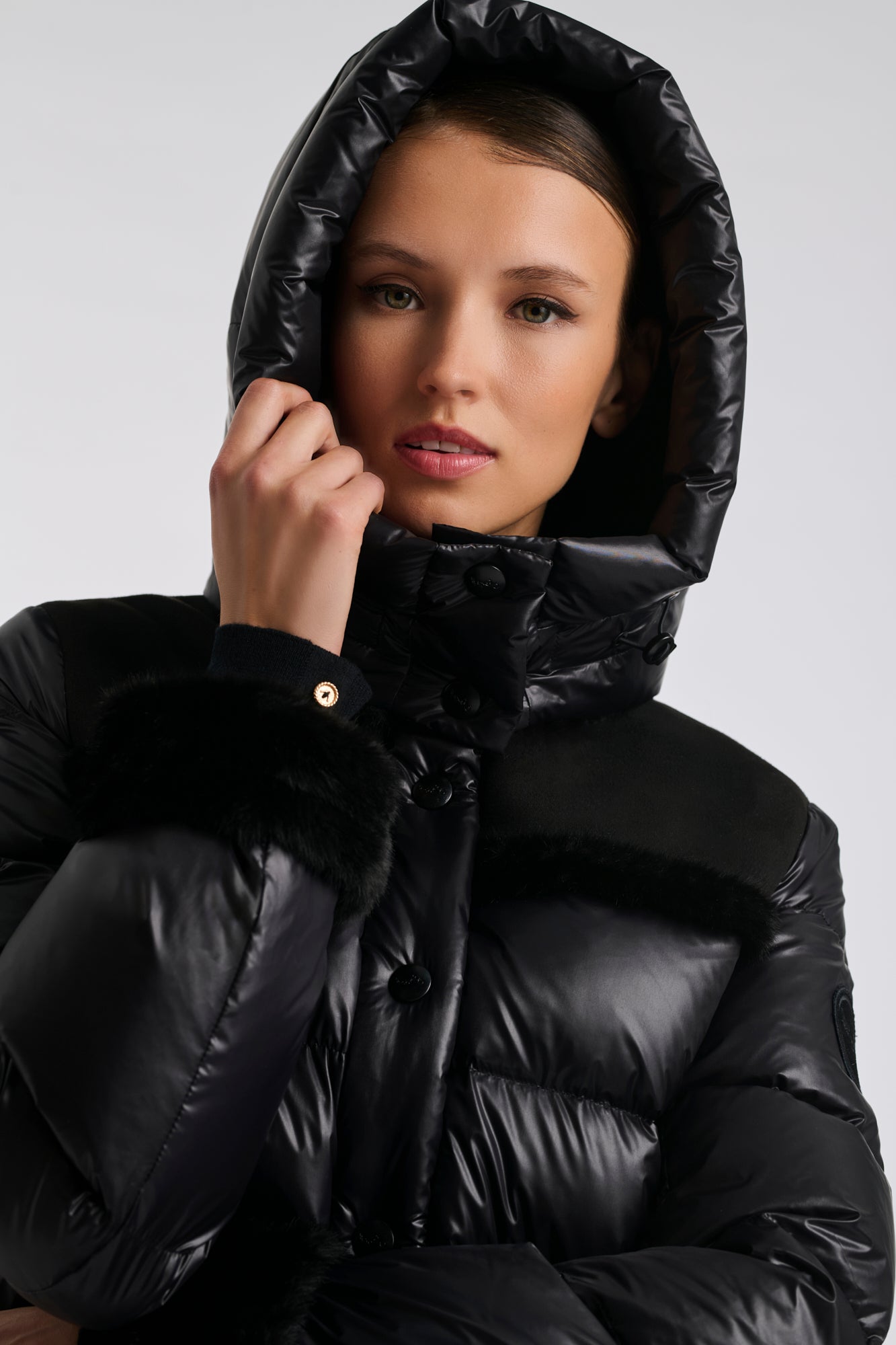 Mid-length down jacket with a fur hood