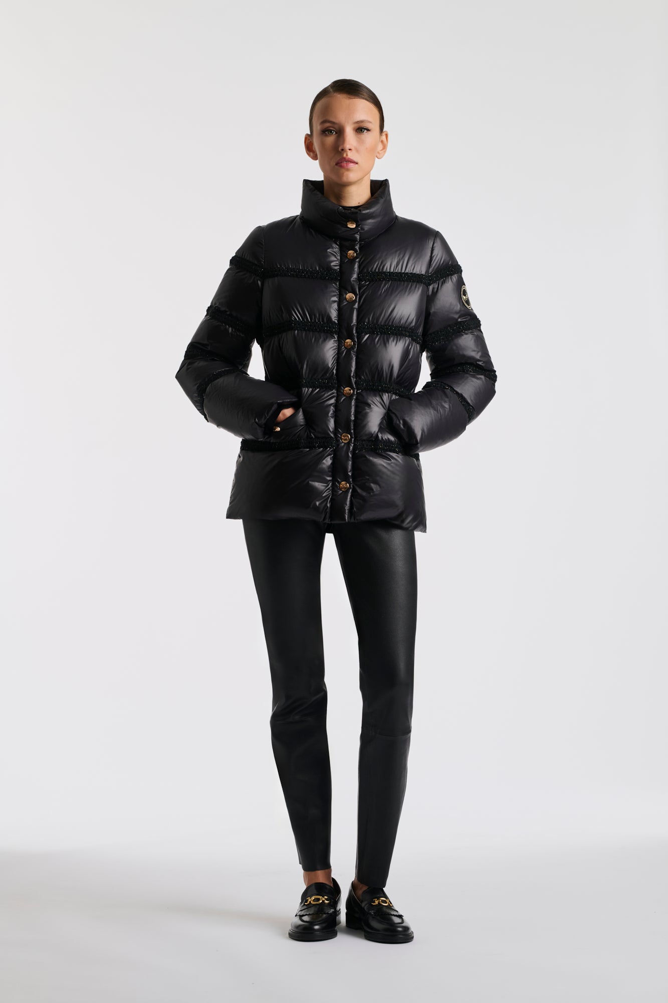 Doudoune noire et or